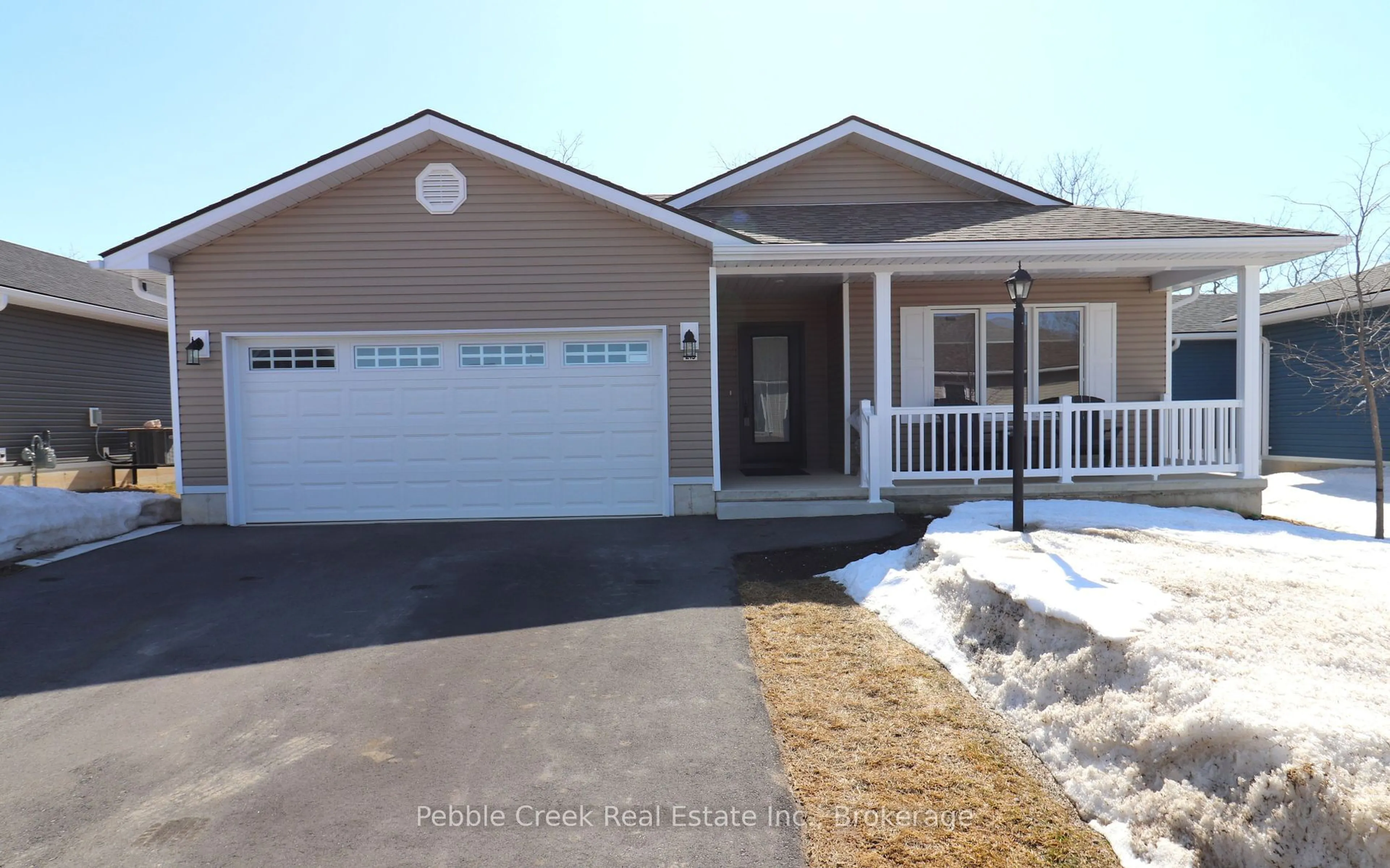 Home with vinyl exterior material, street for 215 Lake Breeze Dr, Ashfield-Colborne-Wawanosh Ontario N7A 0C6