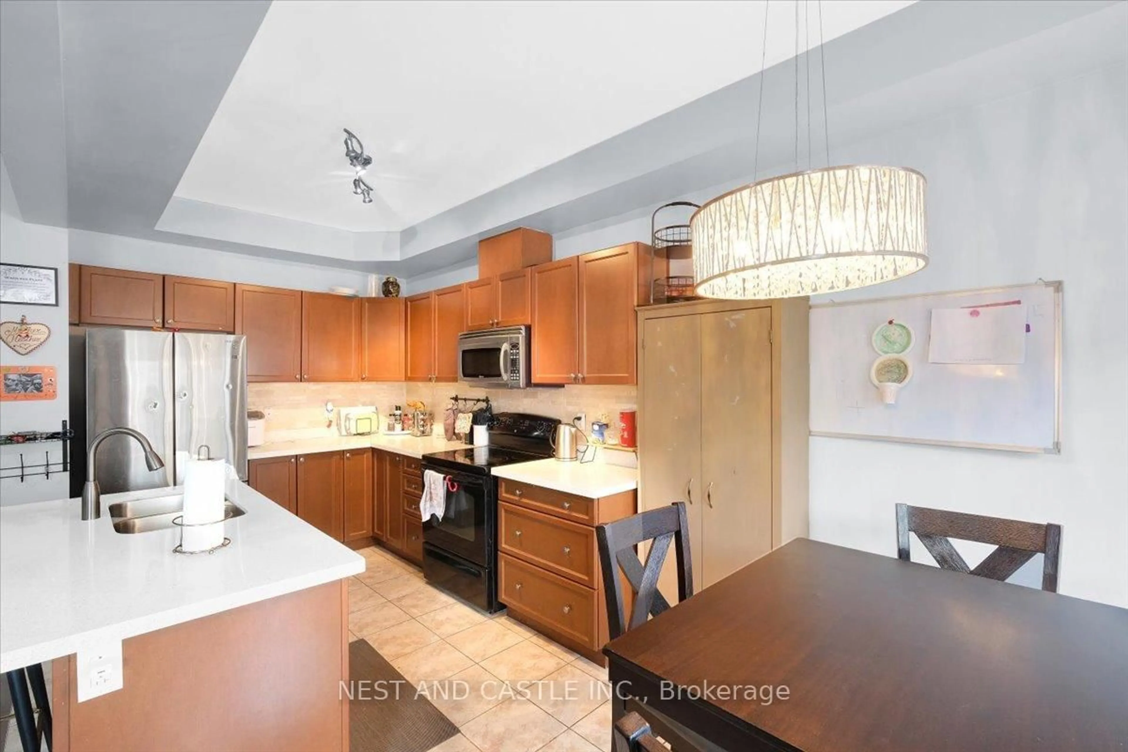 Open concept kitchen, wood/laminate floor for 170 Palacebeach Tr #26, Hamilton Ontario L8E 0H2