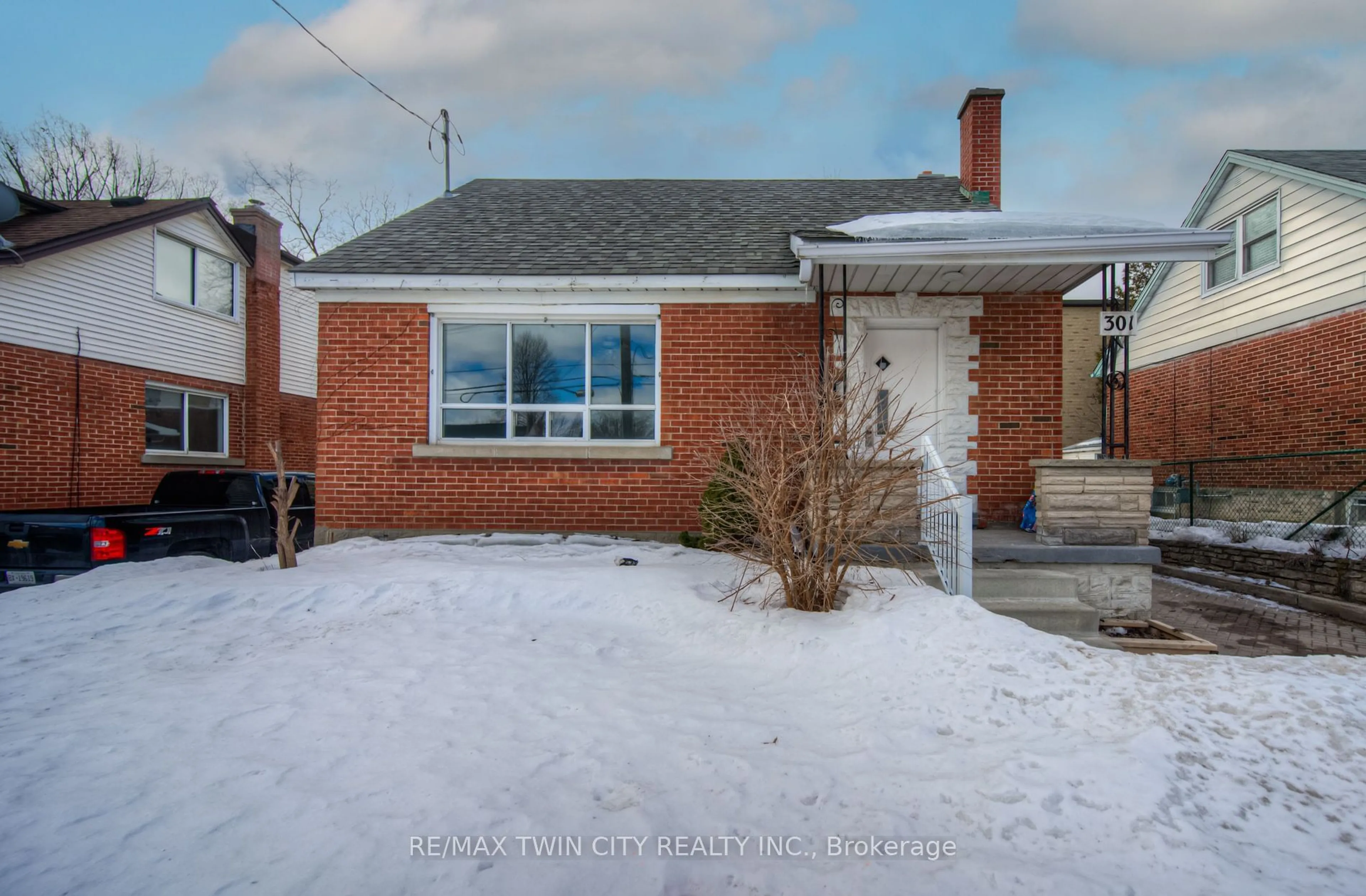 Home with brick exterior material, street for 301 Highland Rd, Kitchener Ontario N2M 3W6