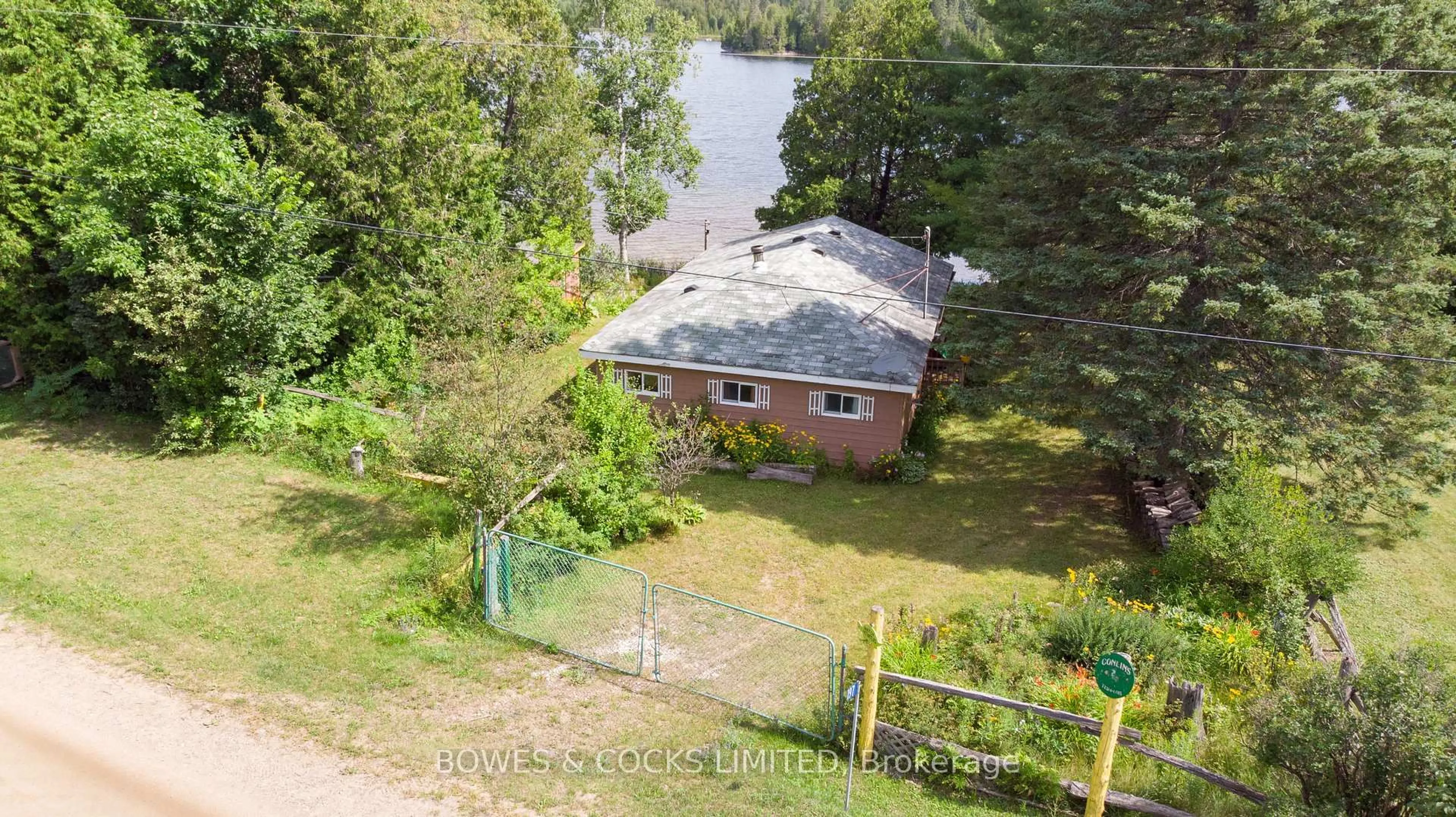 A pic from outside/outdoor area/front of a property/back of a property/a pic from drone, water/lake/river/ocean view for 197 KING Rd, Wollaston Ontario K0L 1P0