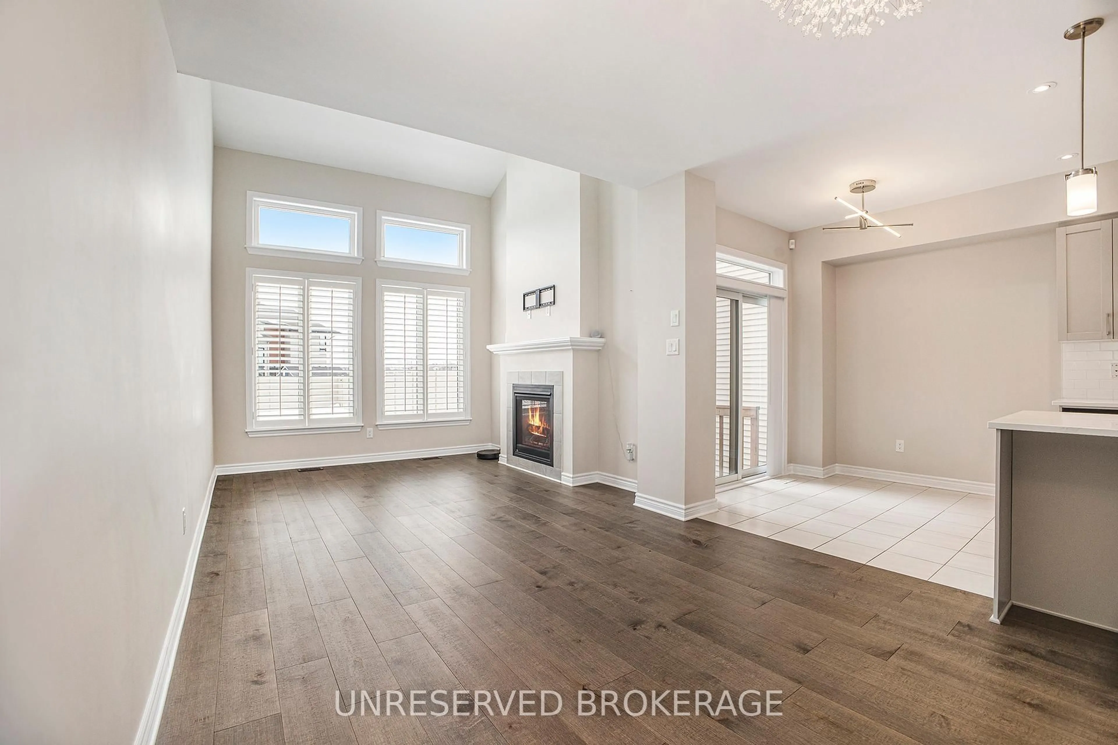 Living room with furniture, wood/laminate floor for 47 Plank St, Kanata Ontario K2S 1E7