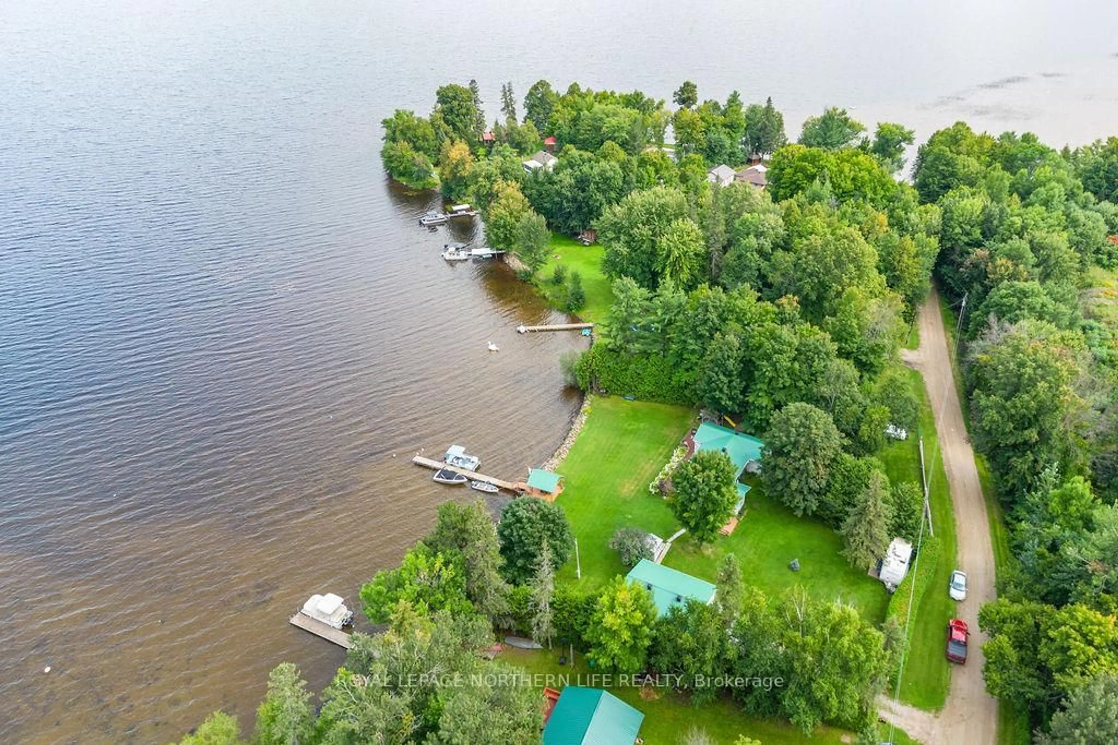 A pic from outside/outdoor area/front of a property/back of a property/a pic from drone, water/lake/river/ocean view for 347 Black Point Rd, Golden Lake Ontario K0J 1X0