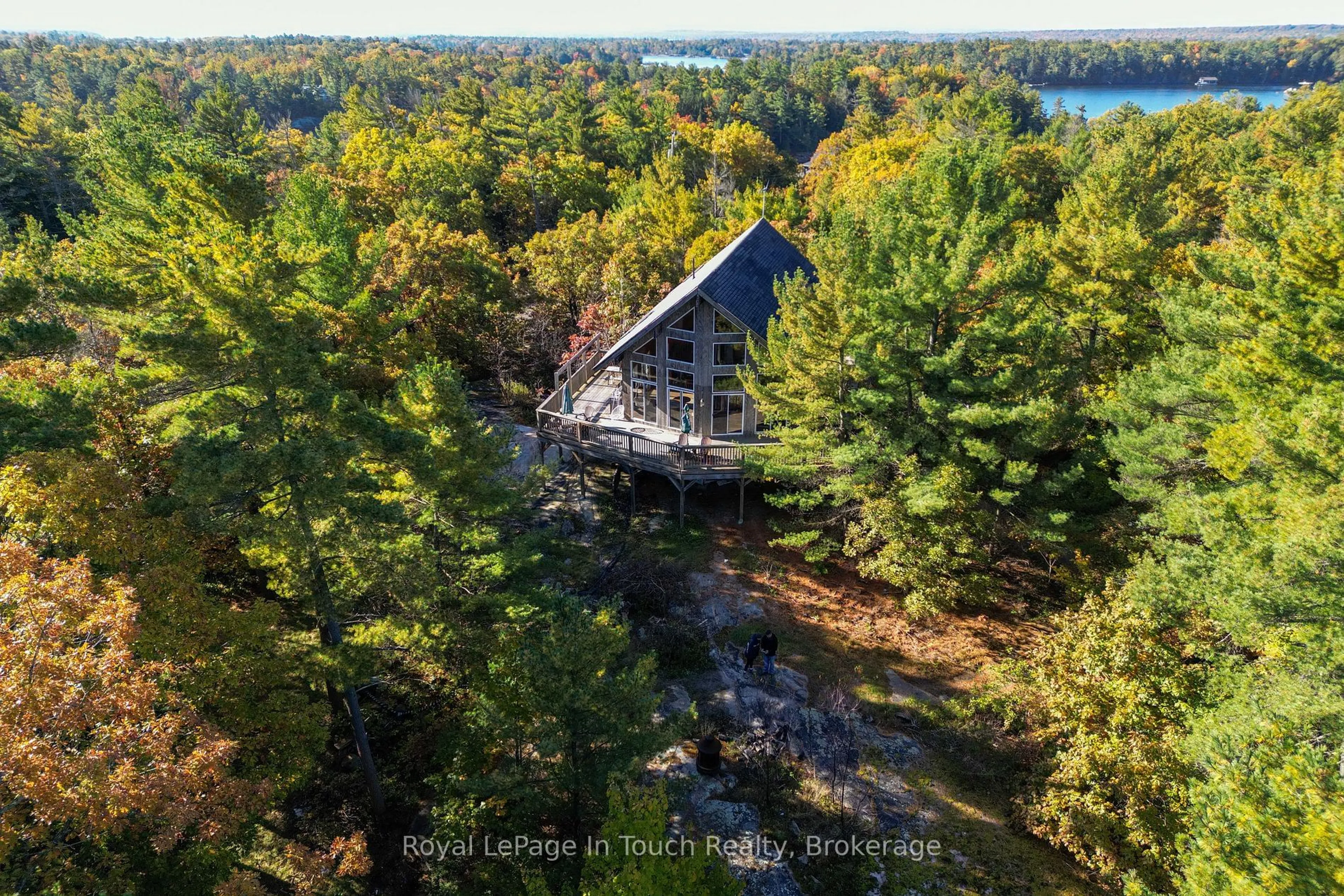 A pic from outside/outdoor area/front of a property/back of a property/a pic from drone, forest/trees view for 1276 Island 980, Georgian Bay Ontario P0E 1E0