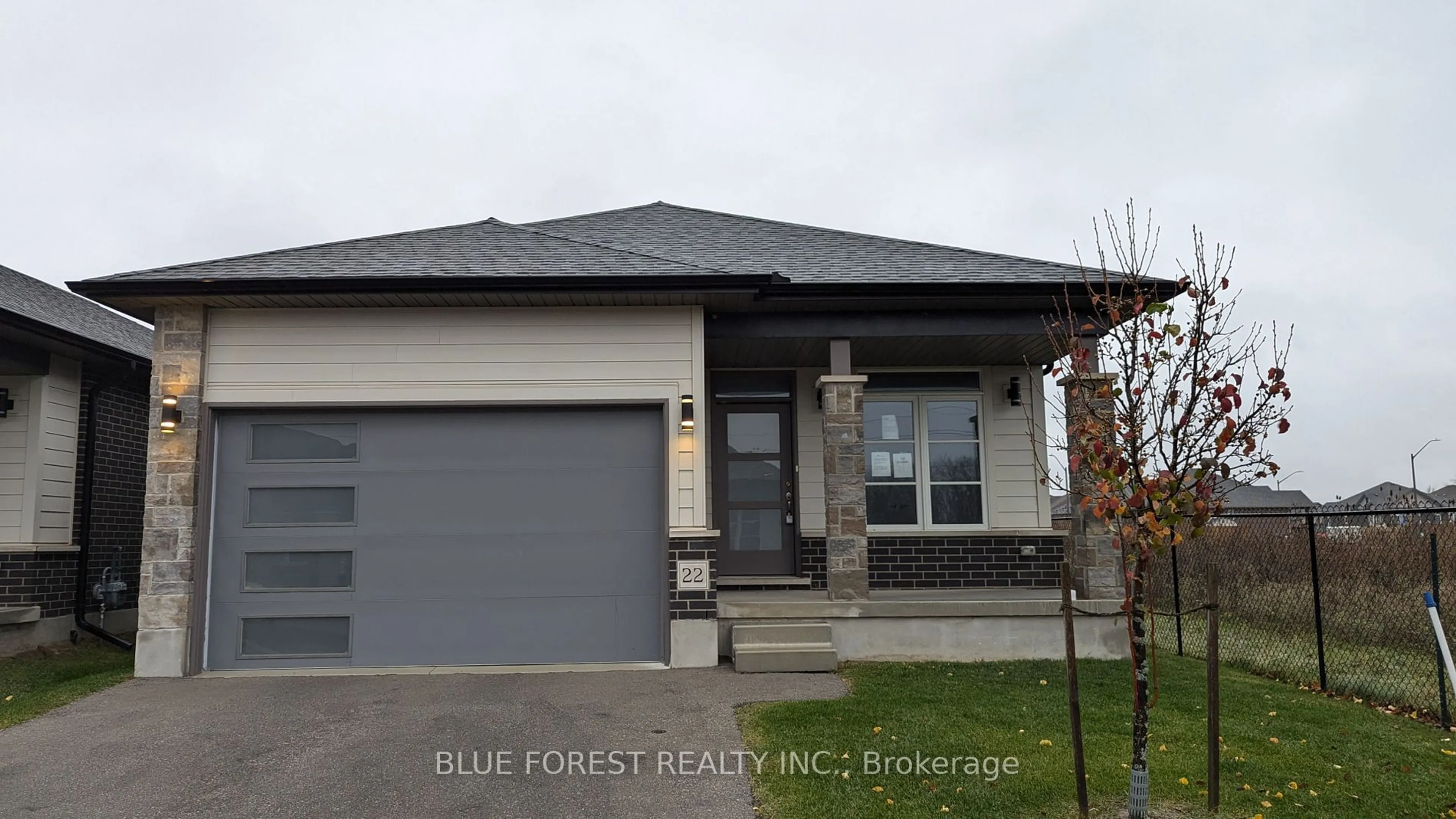 Home with vinyl exterior material, street for 10 Mcpherson Crt #22, St. Thomas Ontario N5P 4N7