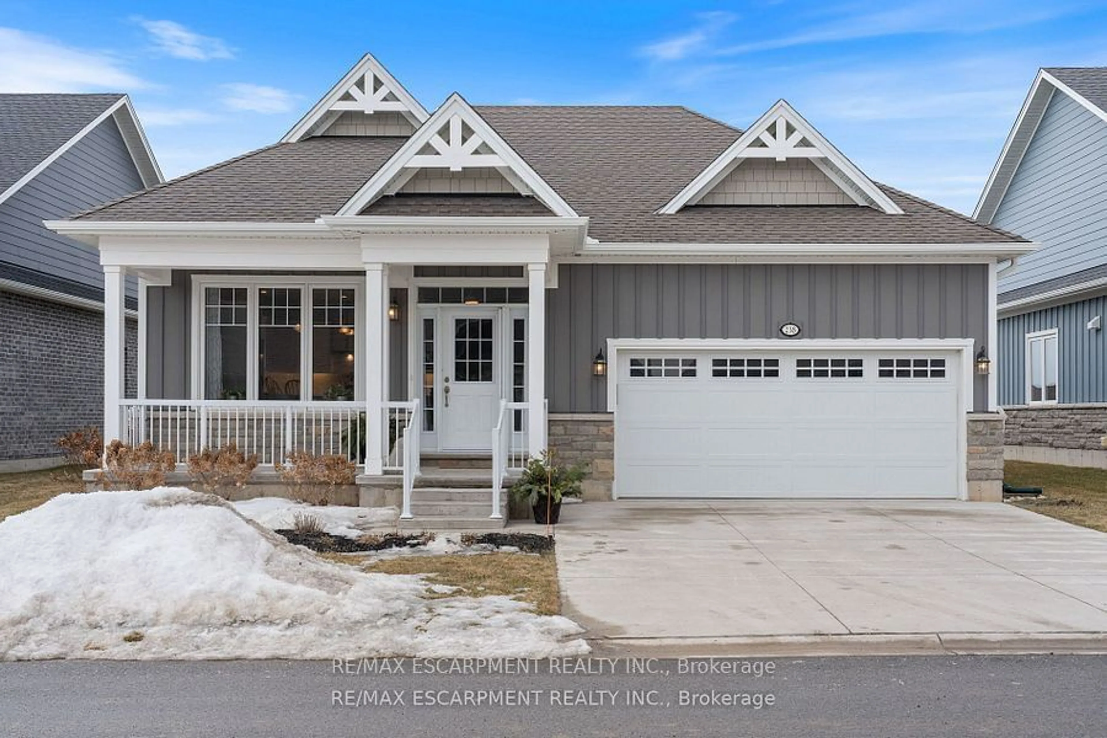 Home with vinyl exterior material, street for 238 SCHOONER Dr, Norfolk Ontario N0A 1N3