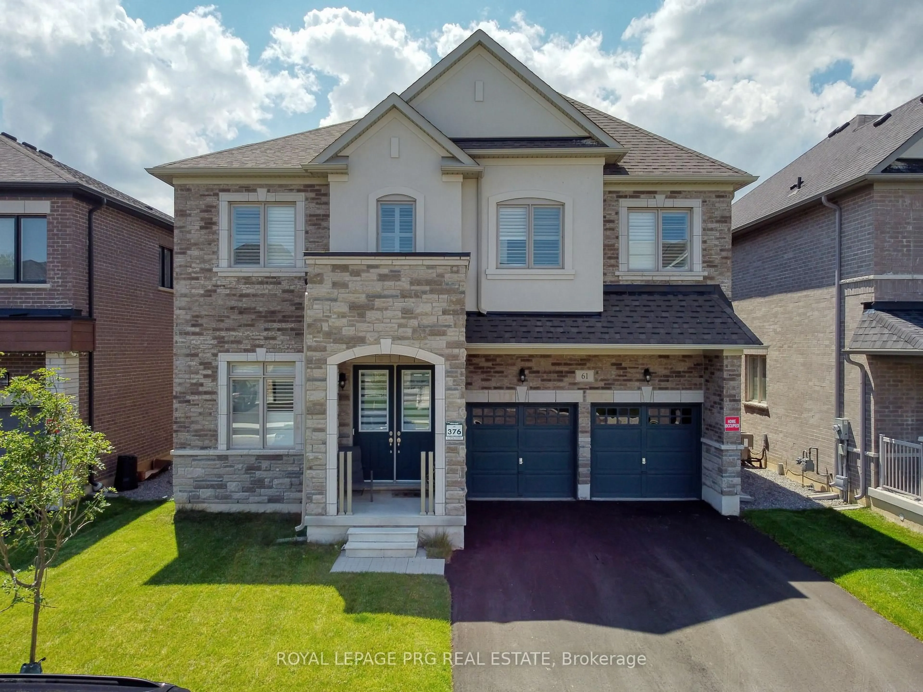 Home with brick exterior material, street for 61 Cattail Cres, Hamilton Ontario L0R 1Z6