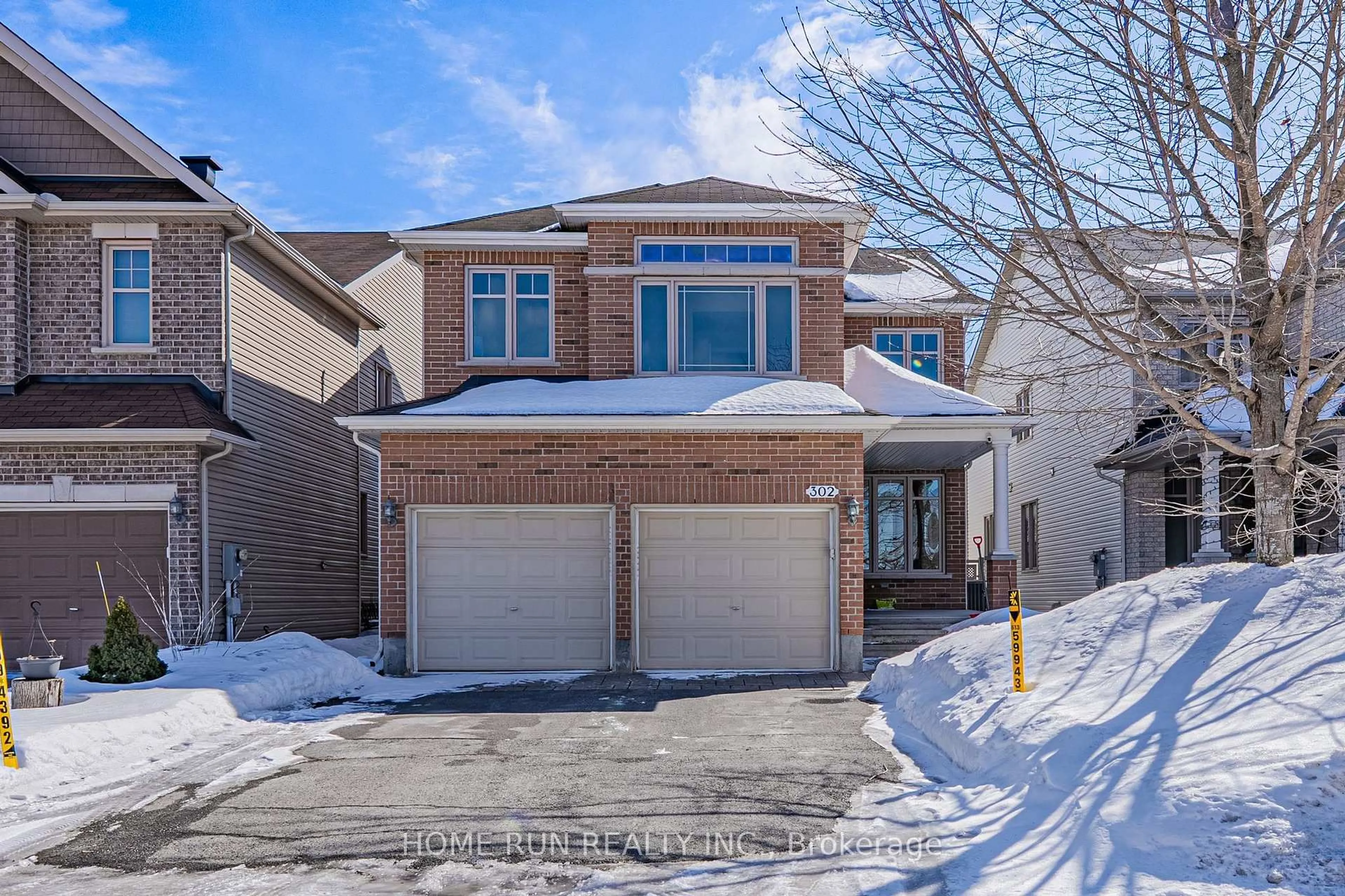 Home with brick exterior material, street for 302 Laughlin Circ, Kanata Ontario K2T 0E1