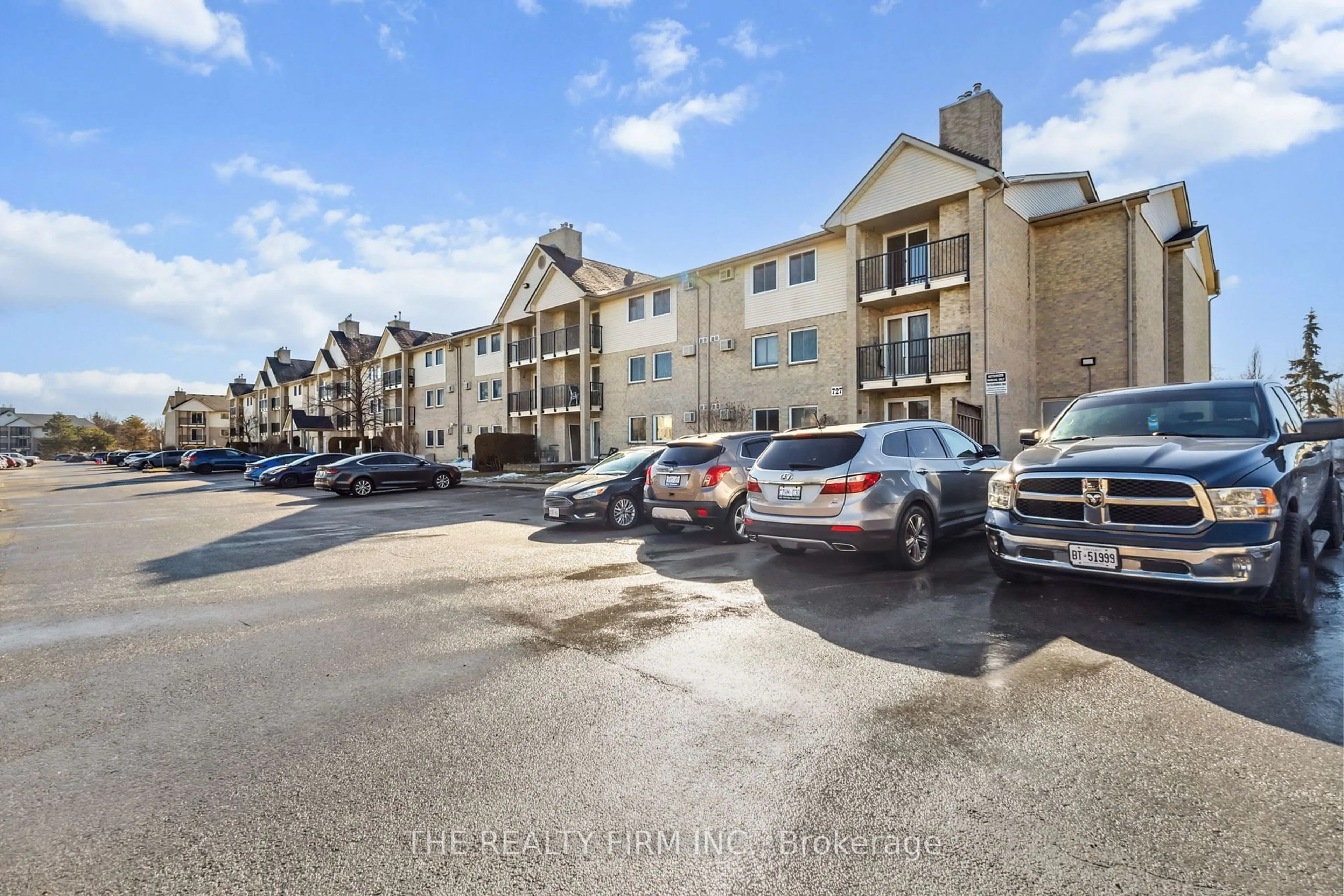 A pic from outside/outdoor area/front of a property/back of a property/a pic from drone, unknown for 727 Deveron Cres #309, London Ontario N5Z 4X4