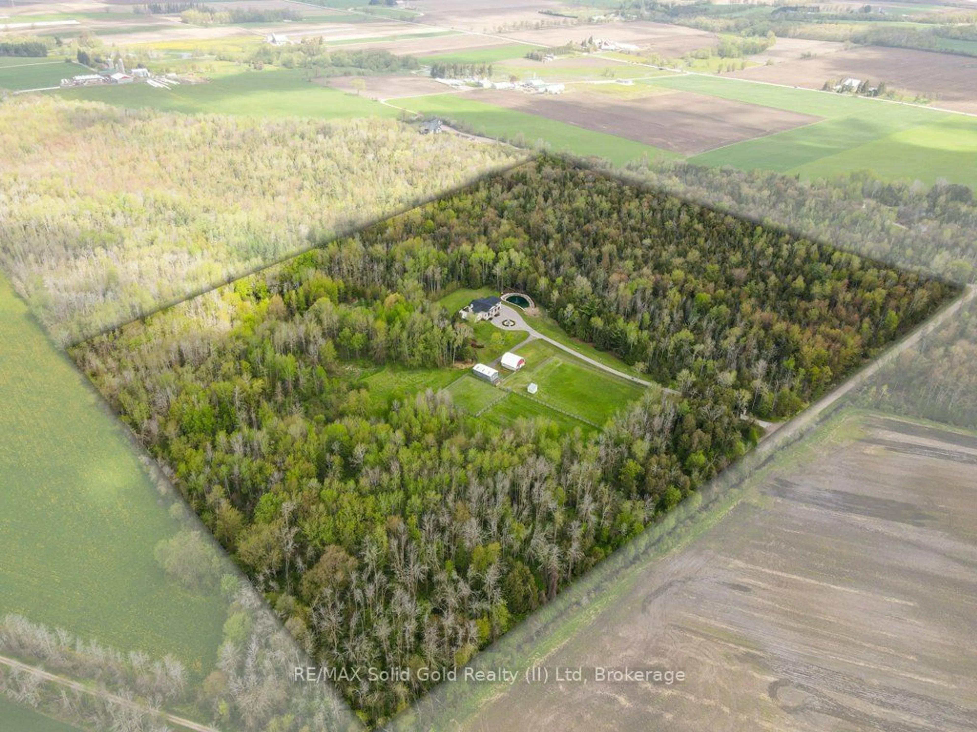 A pic from outside/outdoor area/front of a property/back of a property/a pic from drone, forest/trees view for 7104 Sideroad 14 Sdrd, Centre Wellington Ontario N0B 1B0