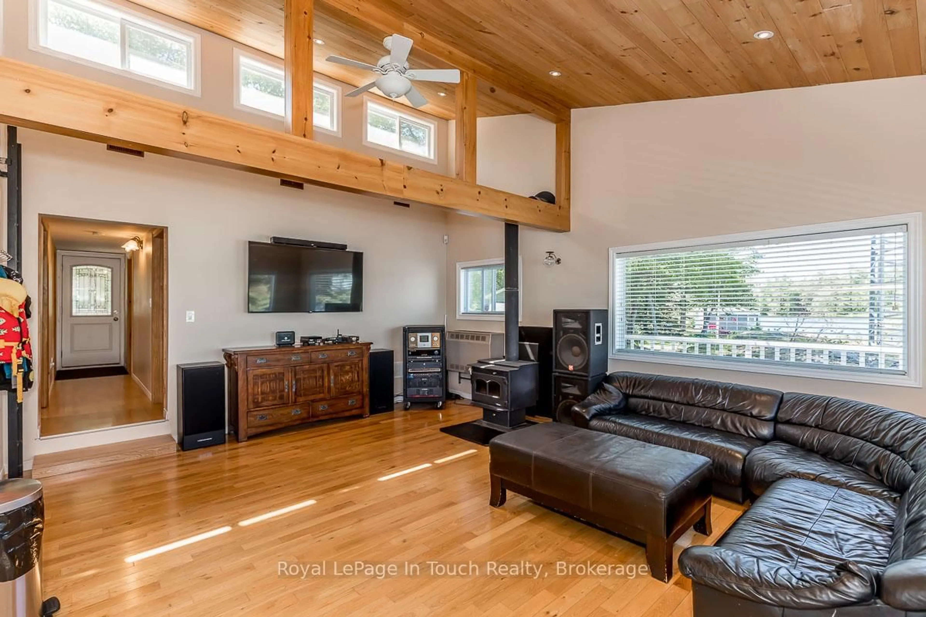 Living room with furniture, wood/laminate floor for 36 Yellowhead Island, Georgian Bay Ontario L0K 1S0