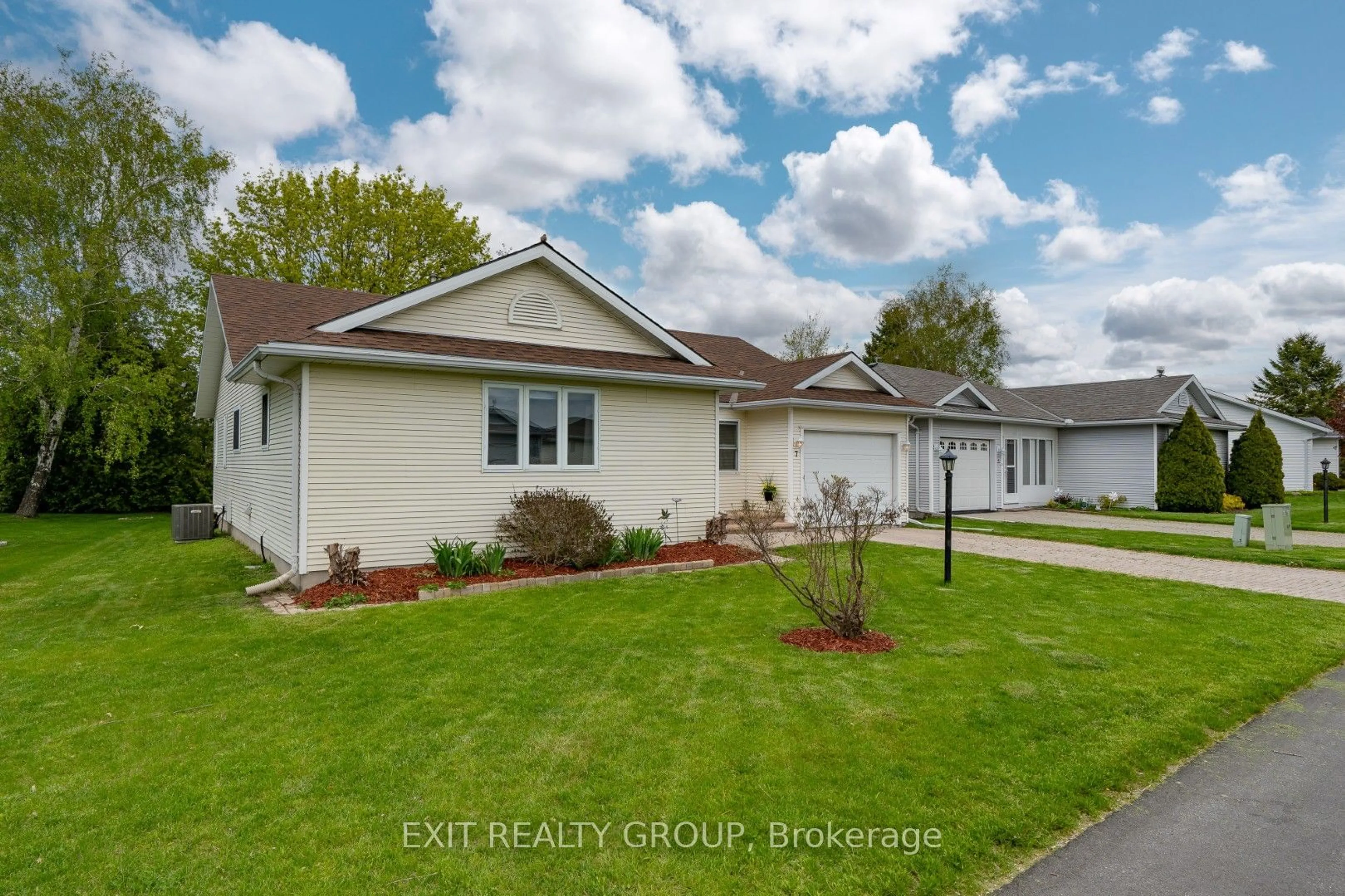 Home with vinyl exterior material, street for 7 Cretney Dr, Prince Edward County Ontario K0K 3L0