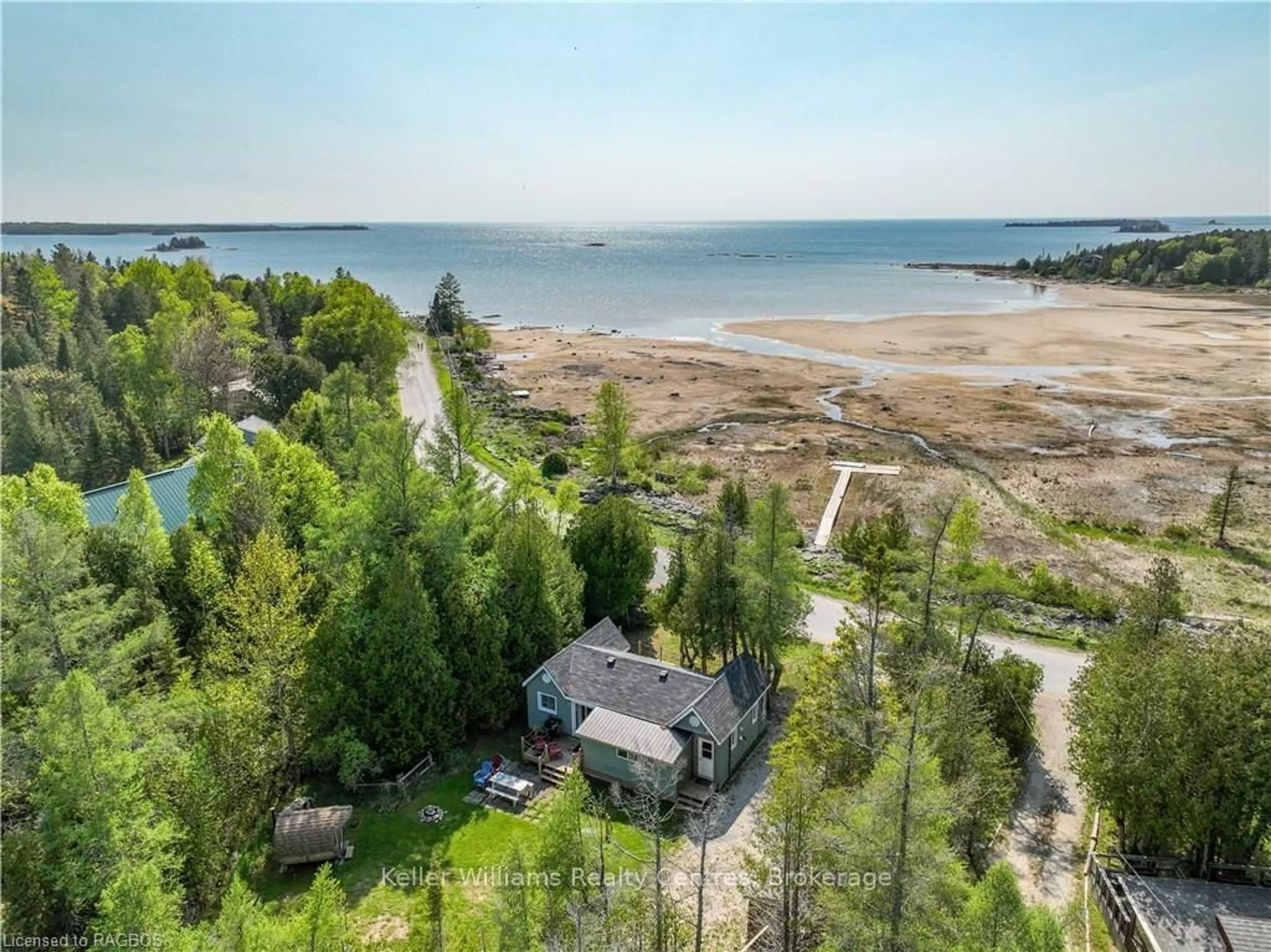 A pic from outside/outdoor area/front of a property/back of a property/a pic from drone, water/lake/river/ocean view for 333 BAY St, South Bruce Peninsula Ontario N0H 2T0