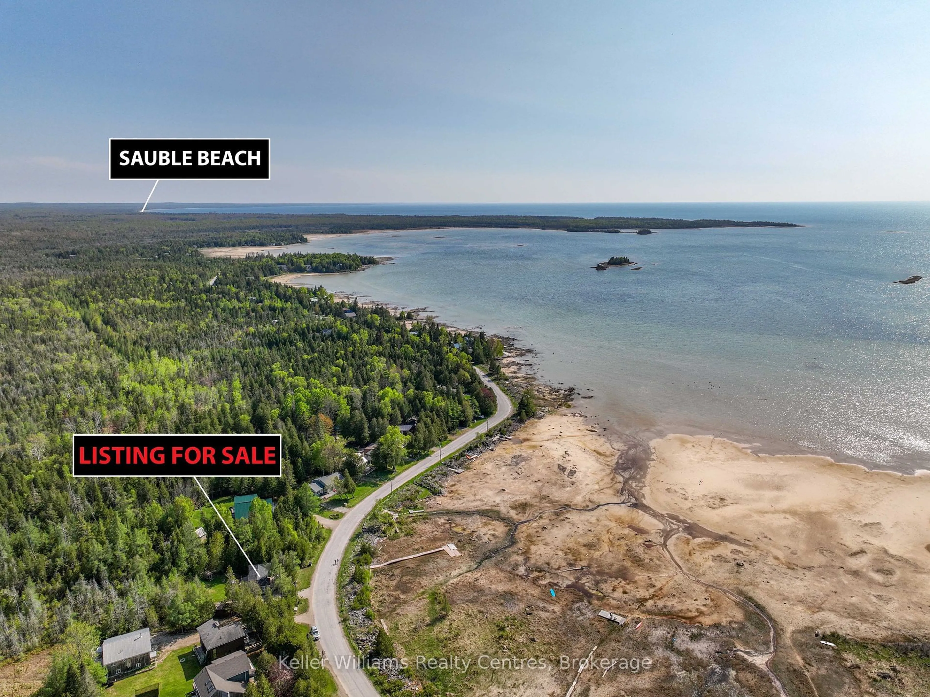 A pic from outside/outdoor area/front of a property/back of a property/a pic from drone, water/lake/river/ocean view for 333 BAY St, South Bruce Peninsula Ontario N0H 2T0