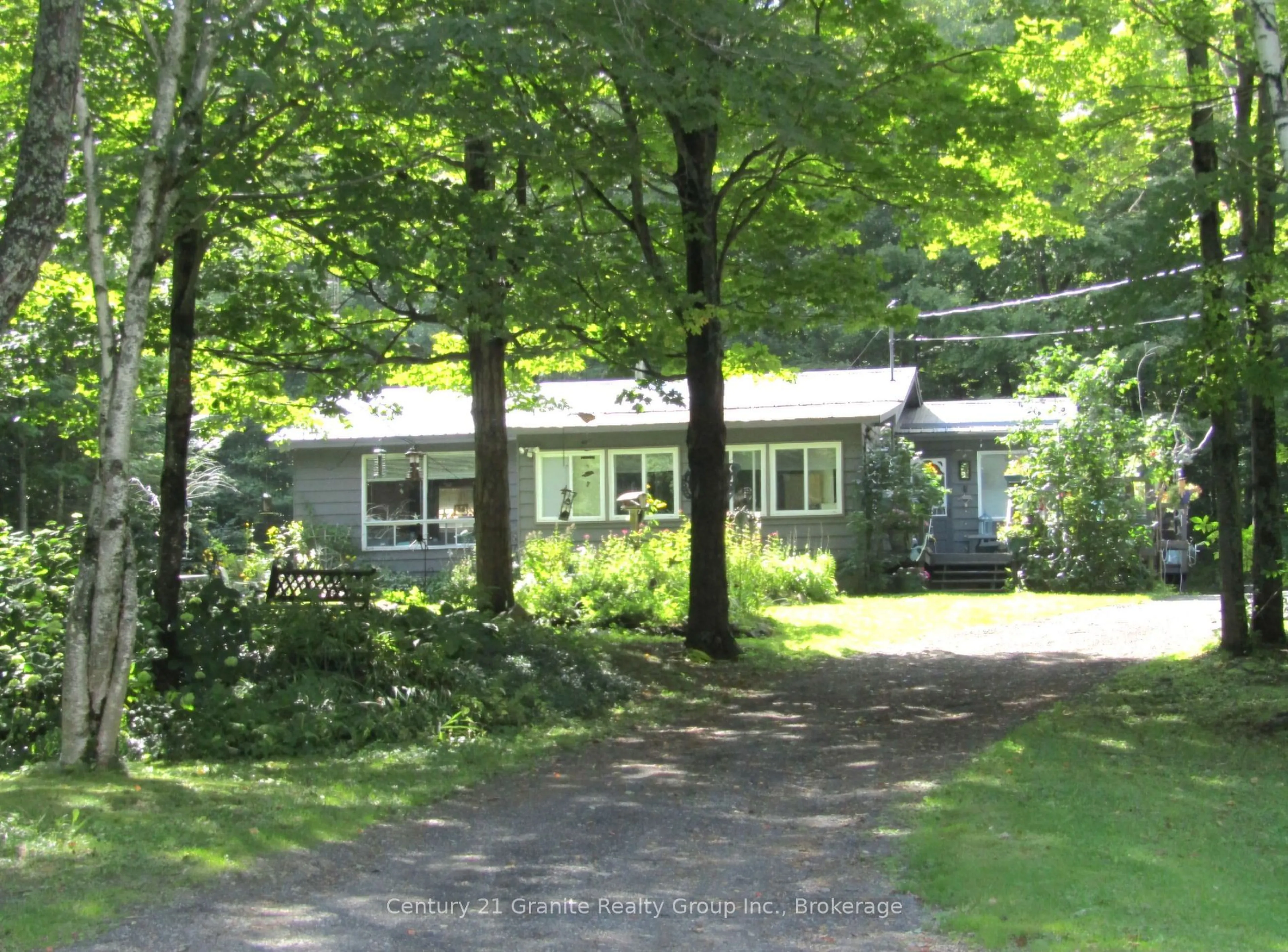 A pic from outside/outdoor area/front of a property/back of a property/a pic from drone, unknown for 1553 Kushog Lake Rd, Algonquin Highlands Ontario K0M 1S0