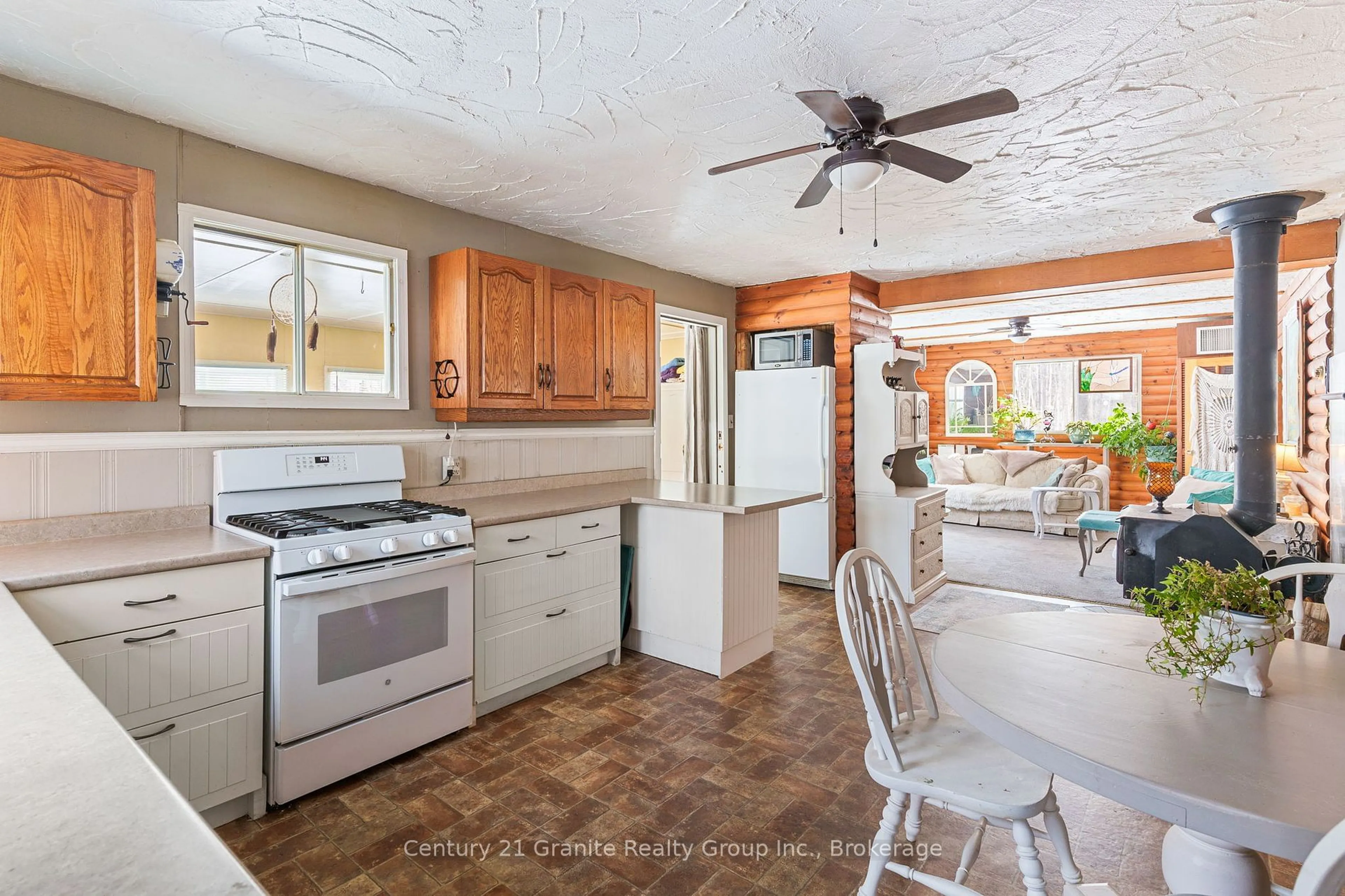 Open concept kitchen, ceramic/tile floor for 1553 Kushog Lake Rd, Algonquin Highlands Ontario K0M 1S0