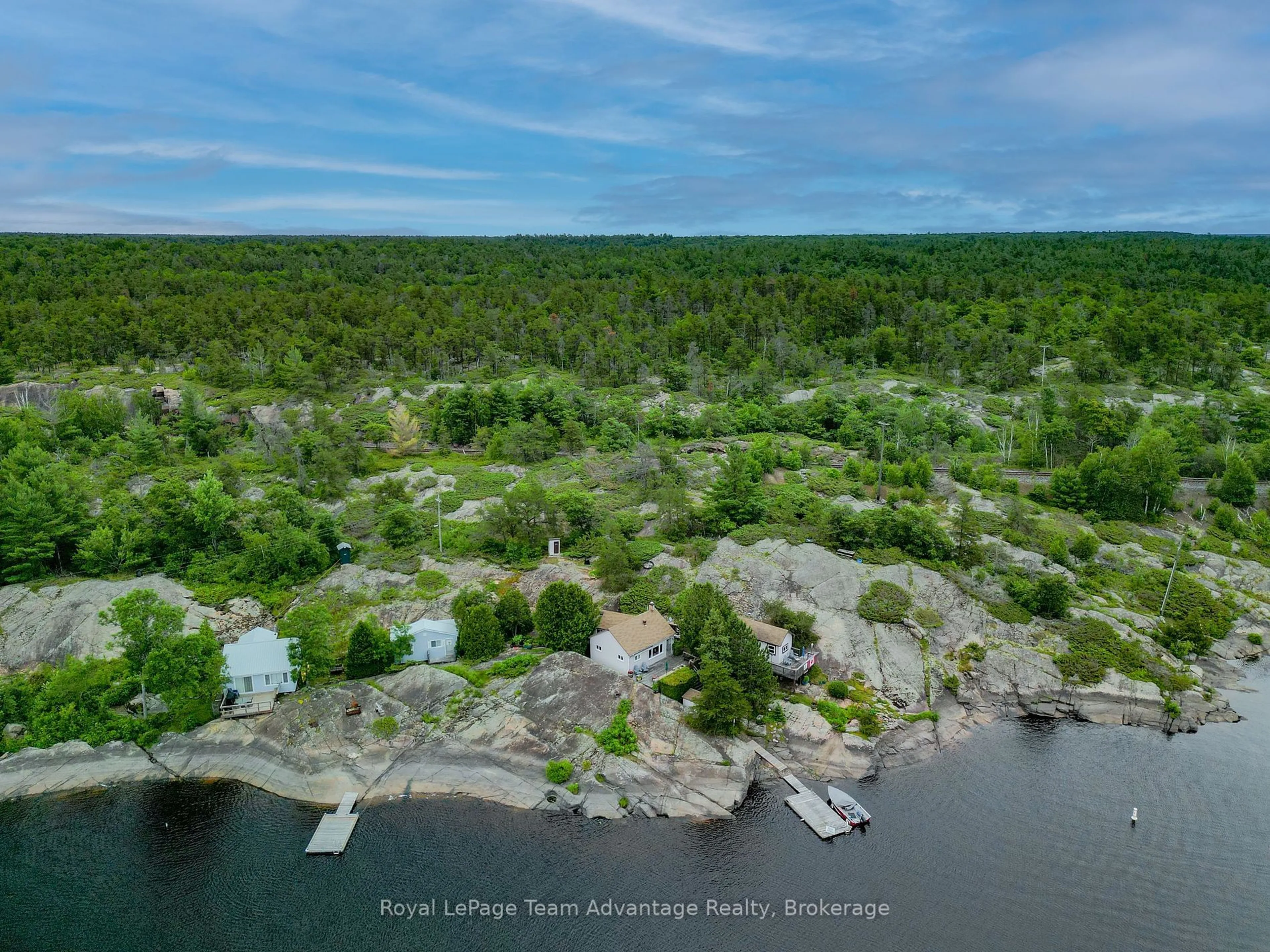 A pic from outside/outdoor area/front of a property/back of a property/a pic from drone, water/lake/river/ocean view for PART 3 ISLAND TP3464, French River Ontario P0M 1A0