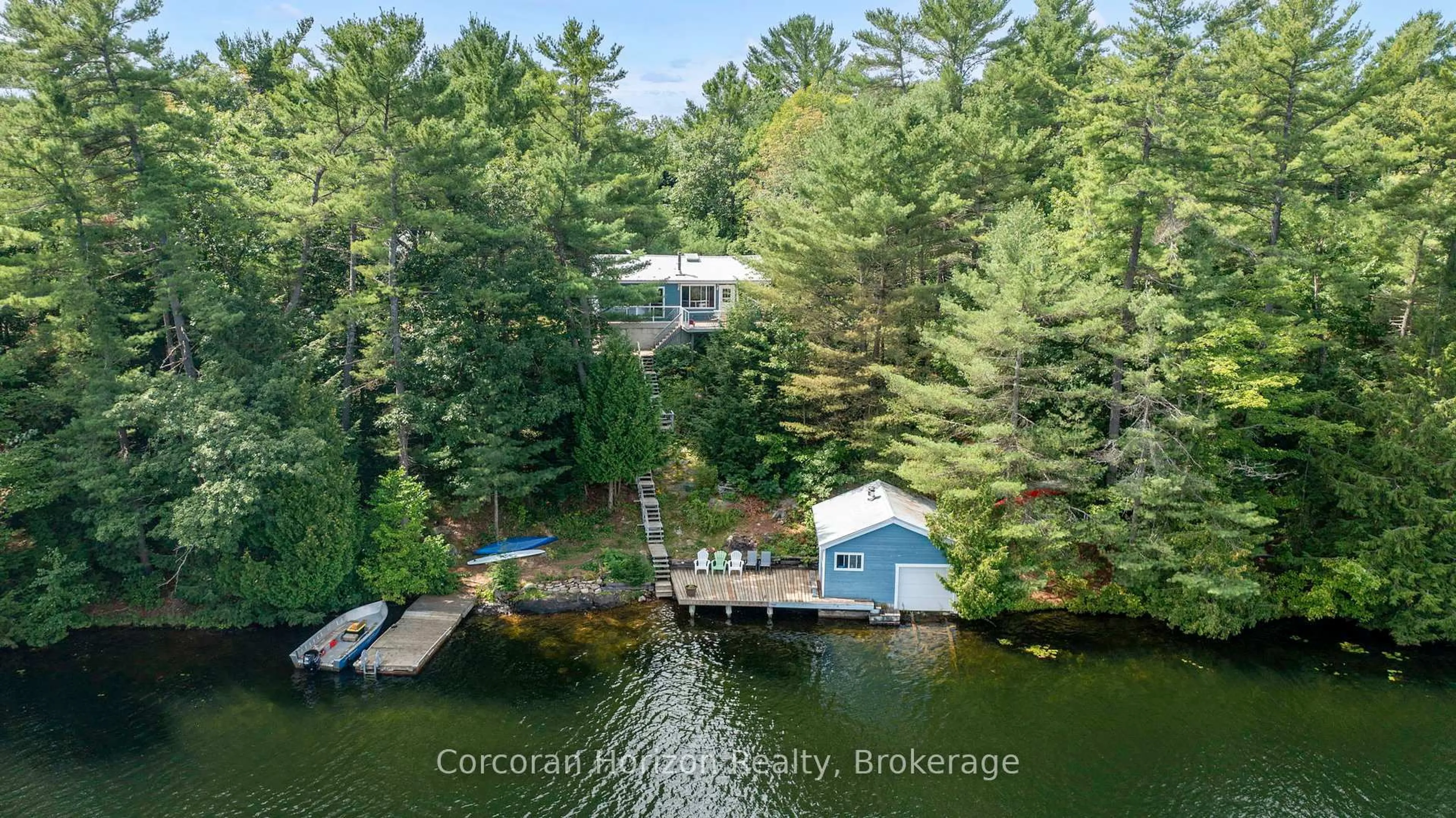 A pic from outside/outdoor area/front of a property/back of a property/a pic from drone, water/lake/river/ocean view for 242 IS 90 SIX MI LAKE Rd, Georgian Bay Ontario L0K 1S0