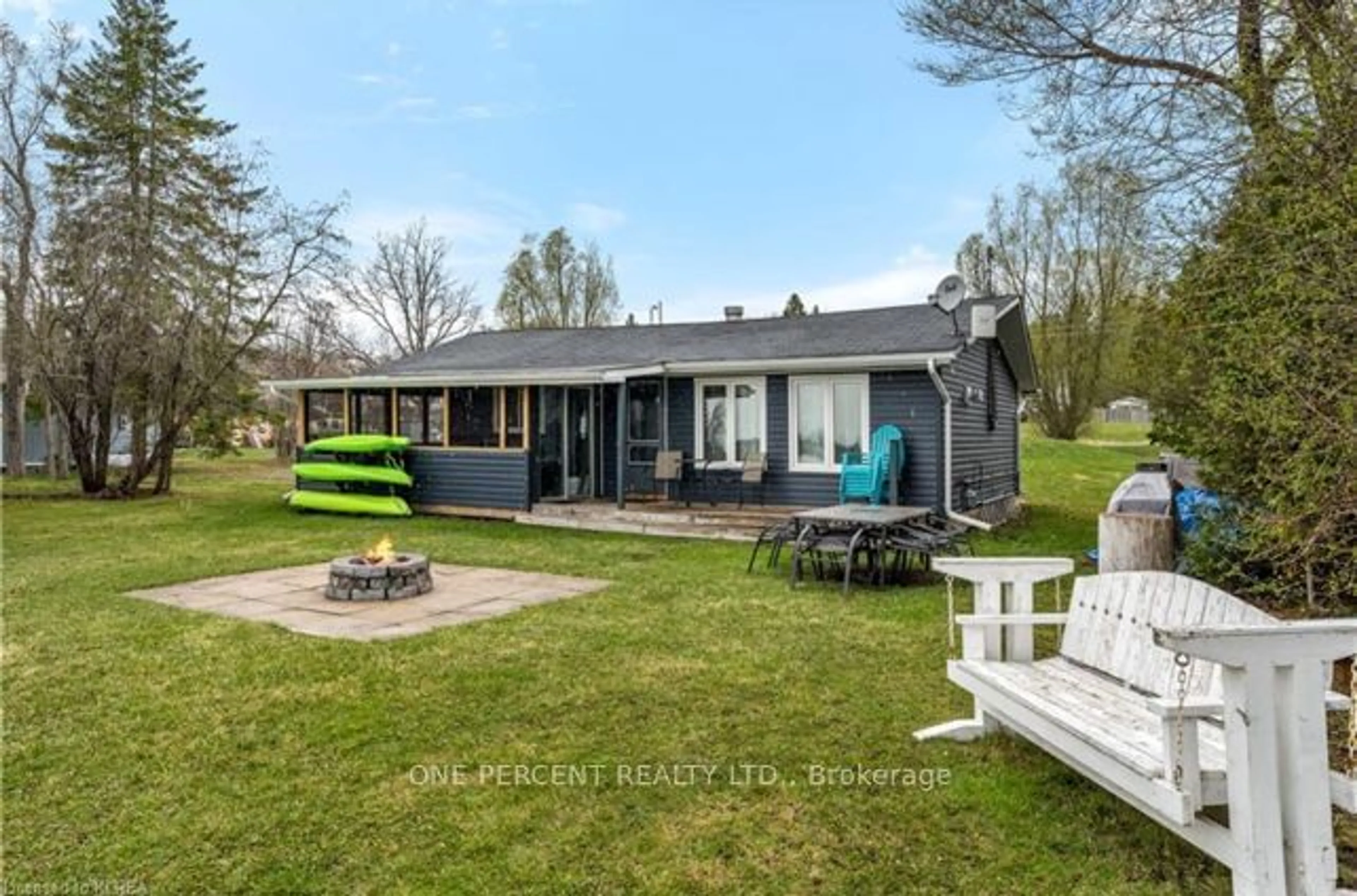 A pic from outside/outdoor area/front of a property/back of a property/a pic from drone, water/lake/river/ocean view for 9 Charlotte Cres, Kawartha Lakes Ontario K0L 2W0