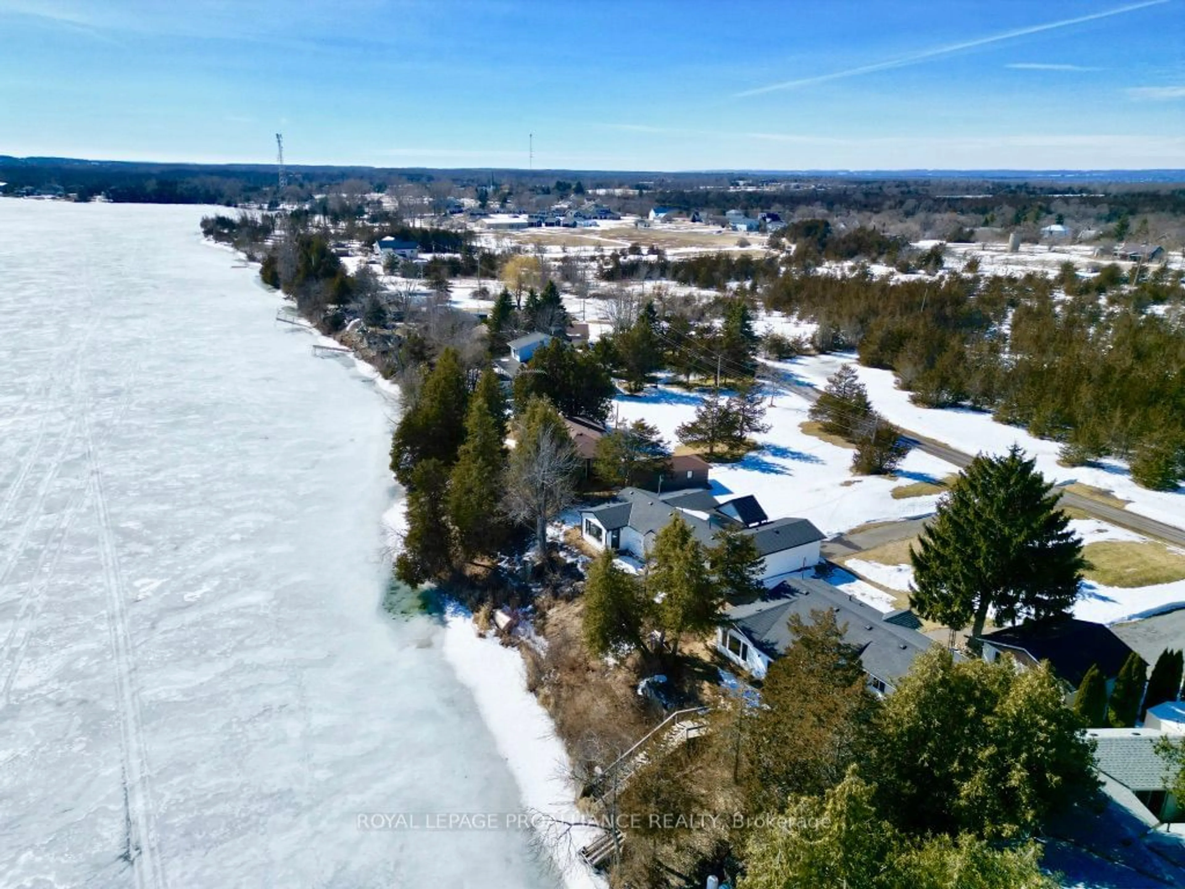 A pic from outside/outdoor area/front of a property/back of a property/a pic from drone, water/lake/river/ocean view for 117 Juniper Lane, Prince Edward County Ontario K0K 1A0