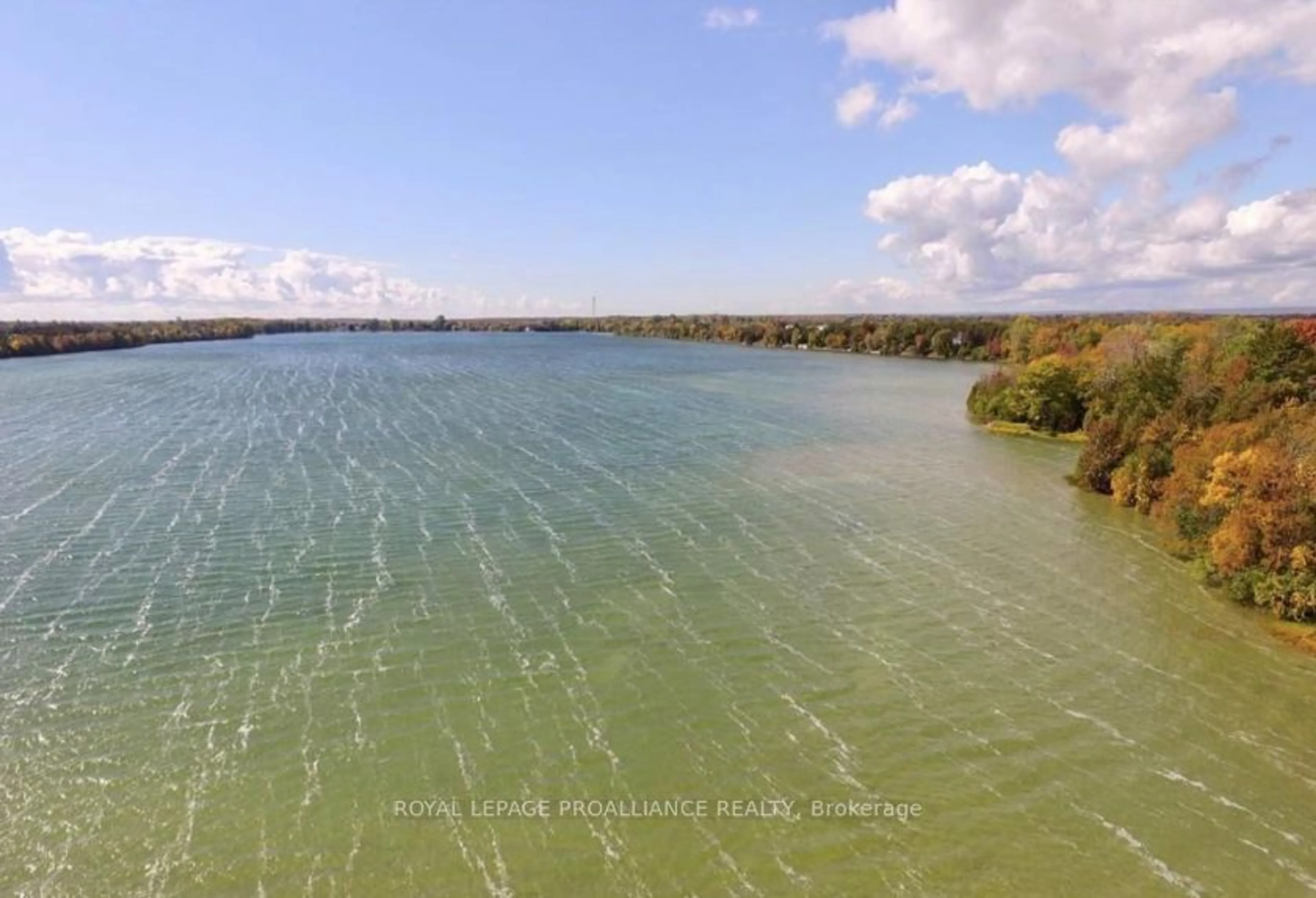 A pic from outside/outdoor area/front of a property/back of a property/a pic from drone, water/lake/river/ocean view for 117 Juniper Lane, Prince Edward County Ontario K0K 1A0