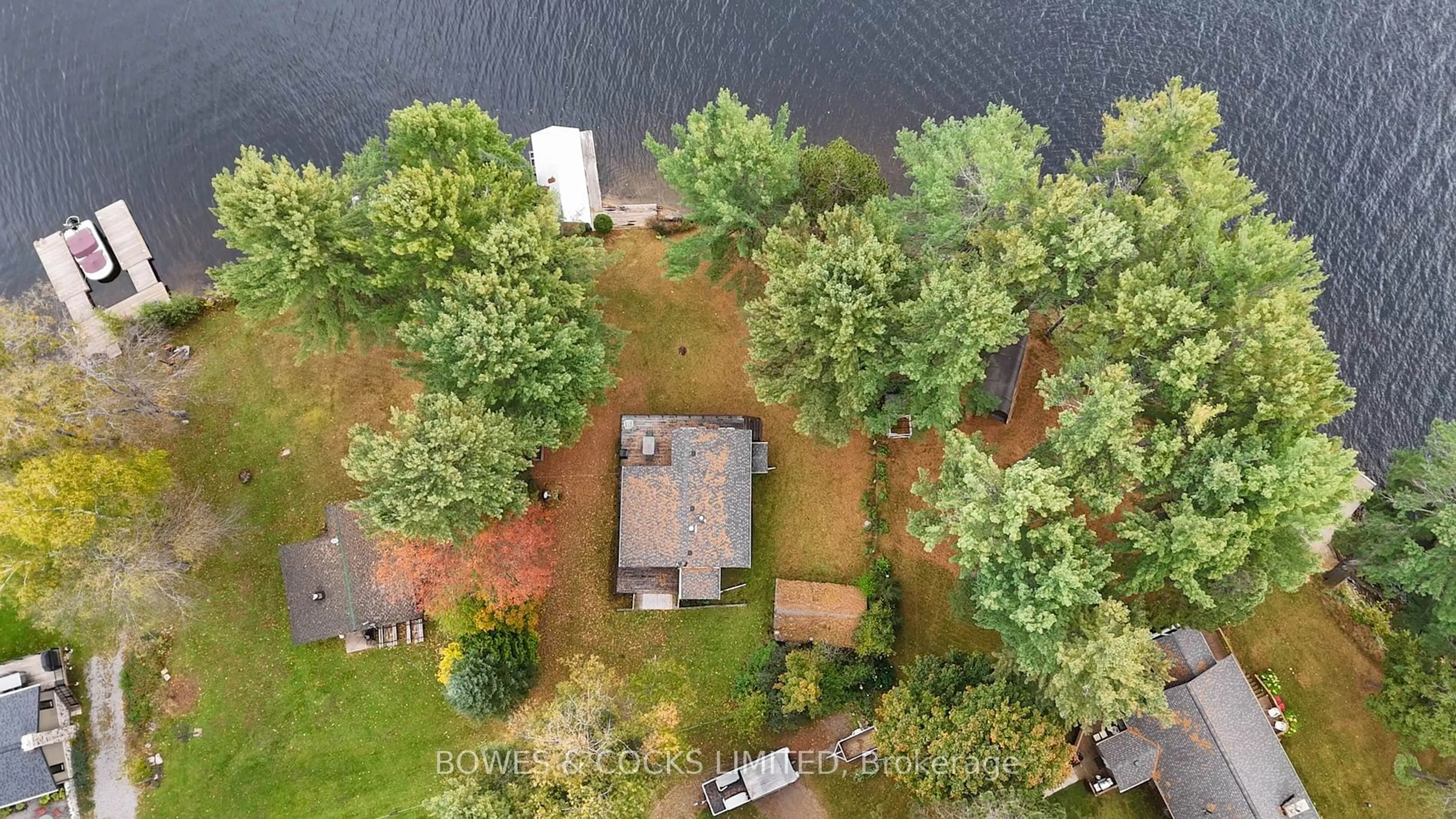 A pic from outside/outdoor area/front of a property/back of a property/a pic from drone, water/lake/river/ocean view for 63B O-At-Ka Rd, Hastings Highlands Ontario K0L 1C0