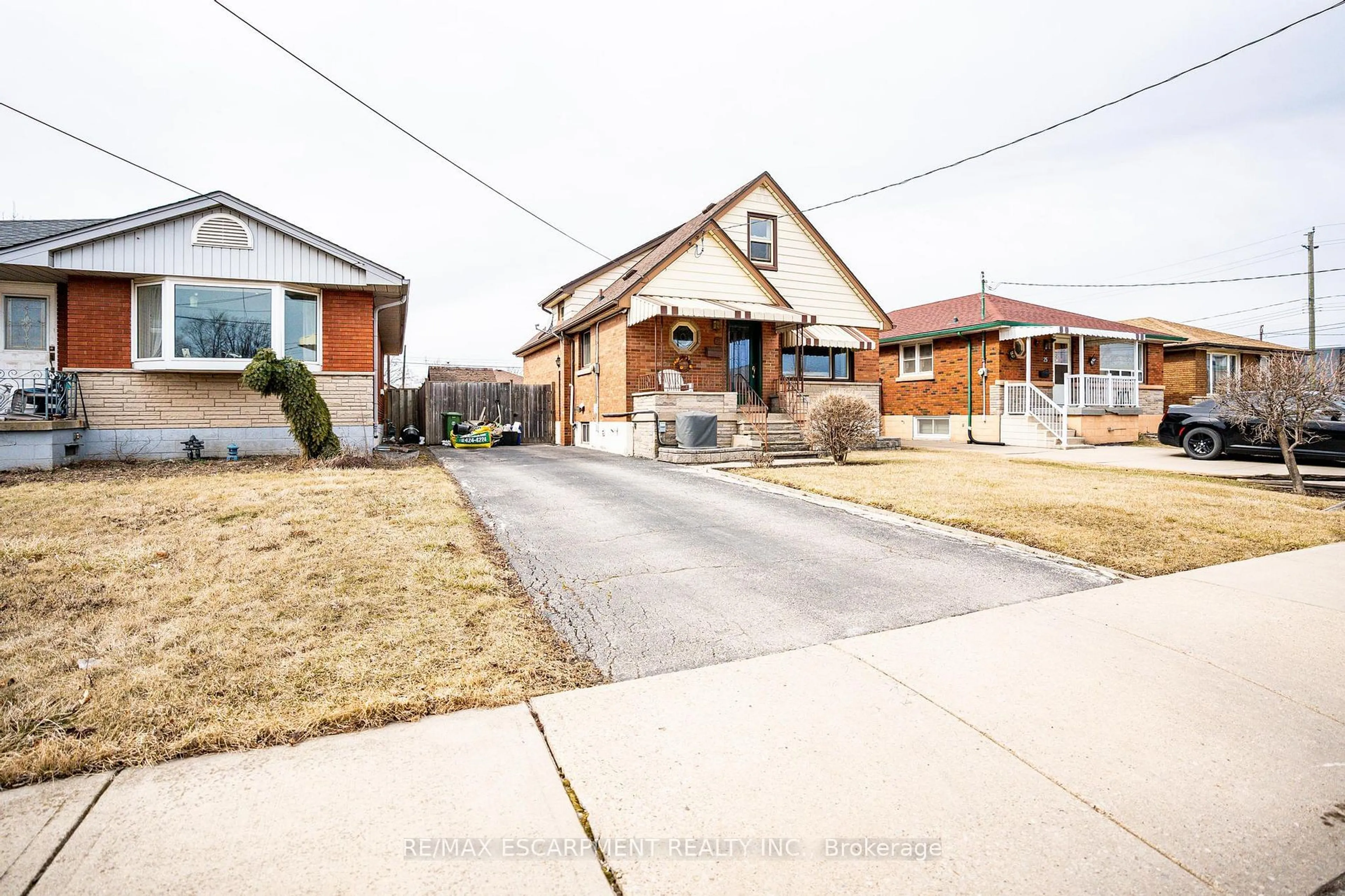 Home with brick exterior material, street for 21 Shynal Ave, Hamilton Ontario L8G 6J9