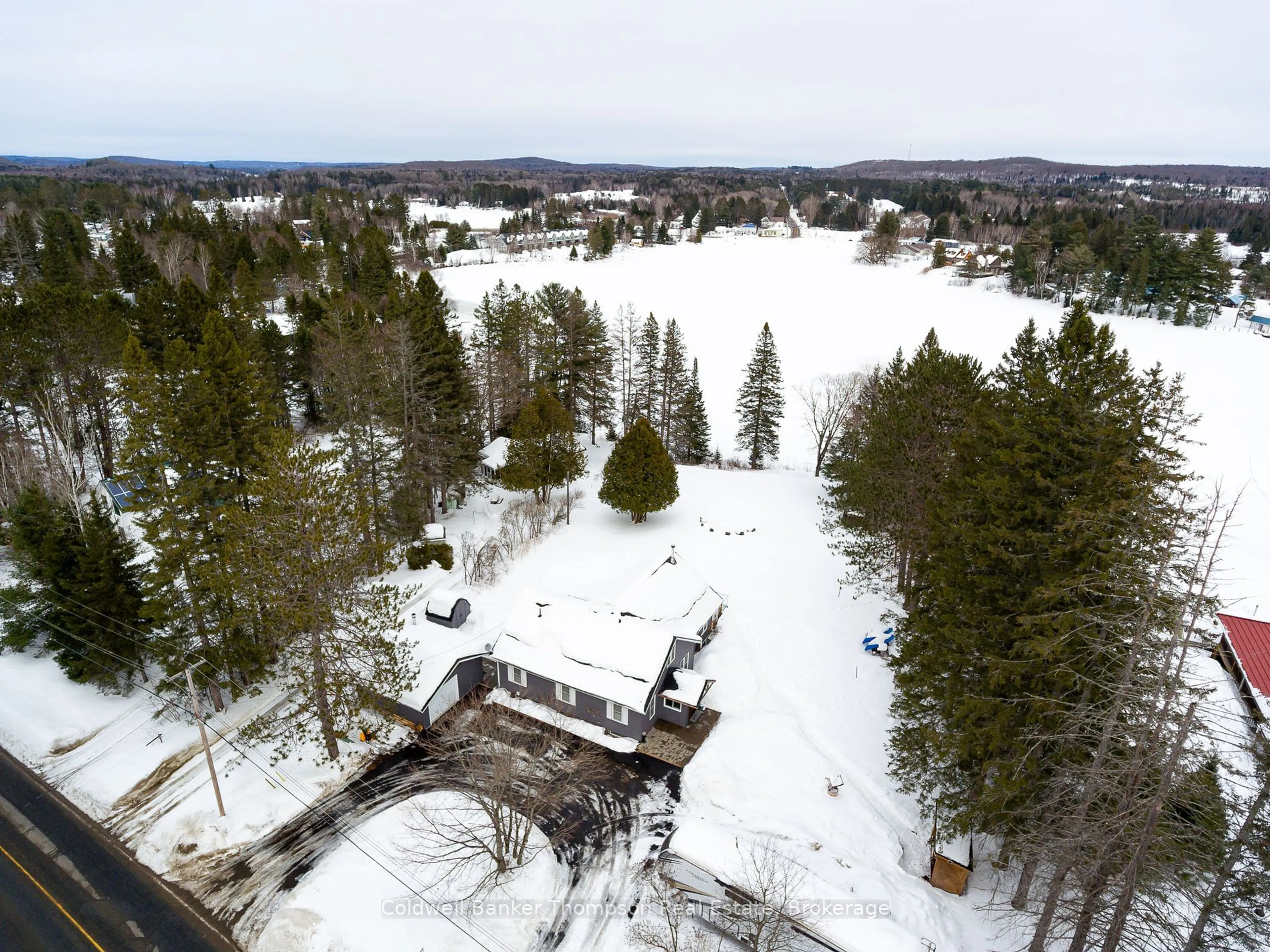 A pic from outside/outdoor area/front of a property/back of a property/a pic from drone, unknown for 1645 Highway 518 East N/A, Kearney Ontario P0A 1M0