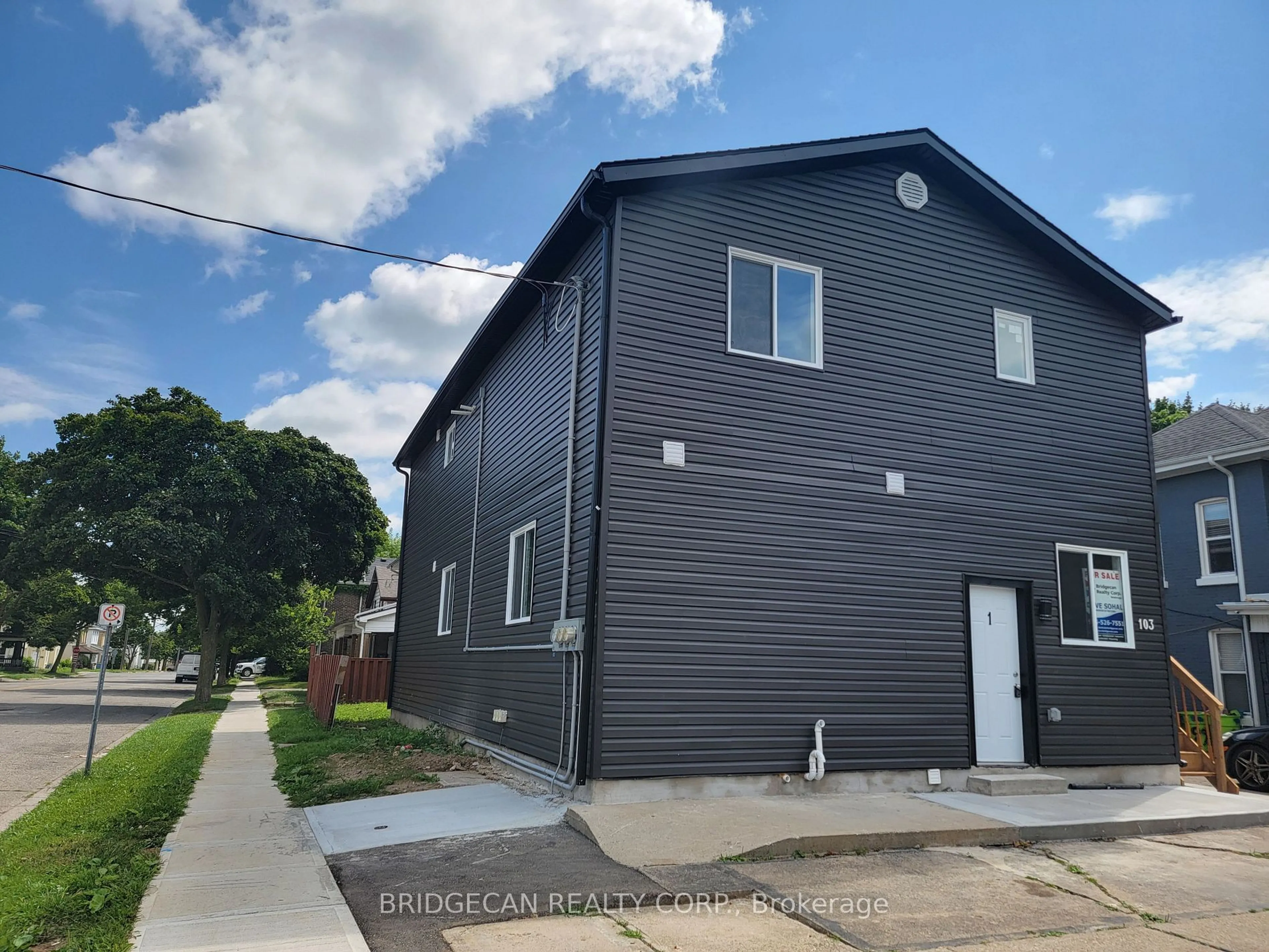 Home with vinyl exterior material, street for 103 Peel St, Brantford Ontario N3S 5M3