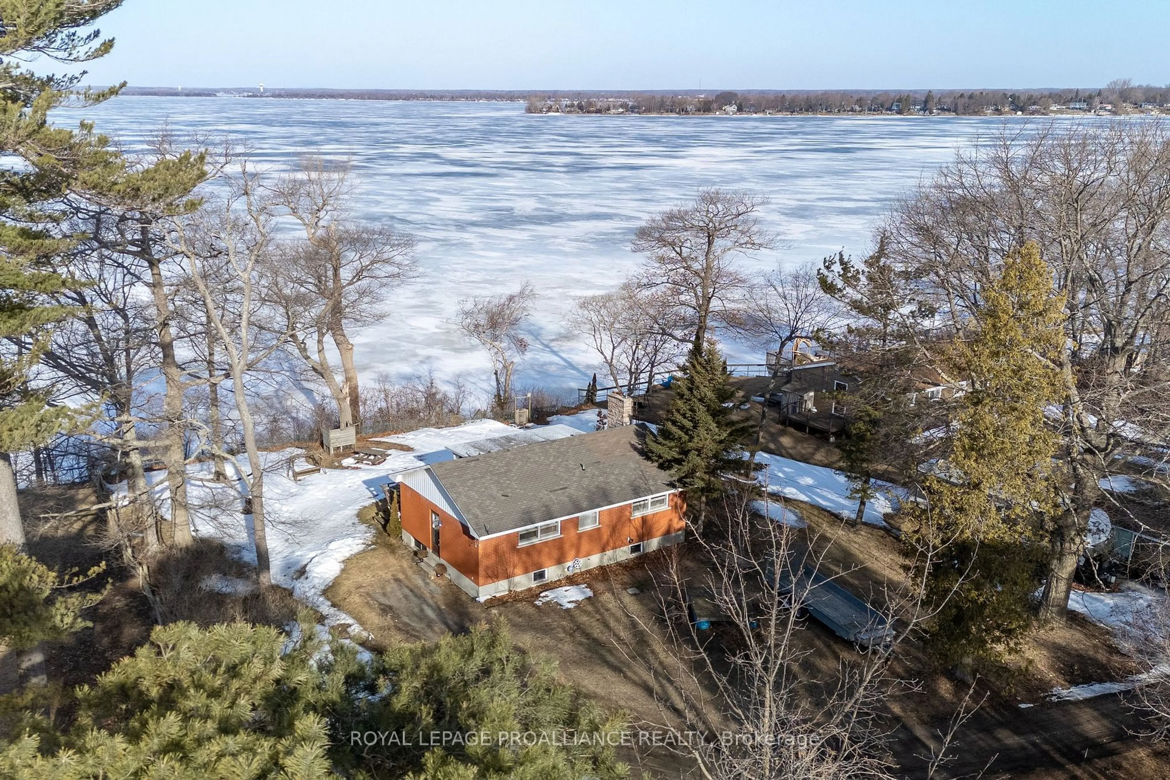 A pic from outside/outdoor area/front of a property/back of a property/a pic from drone, water/lake/river/ocean view for 40 Mayne Lane, Prince Edward County Ontario K0K 2T0