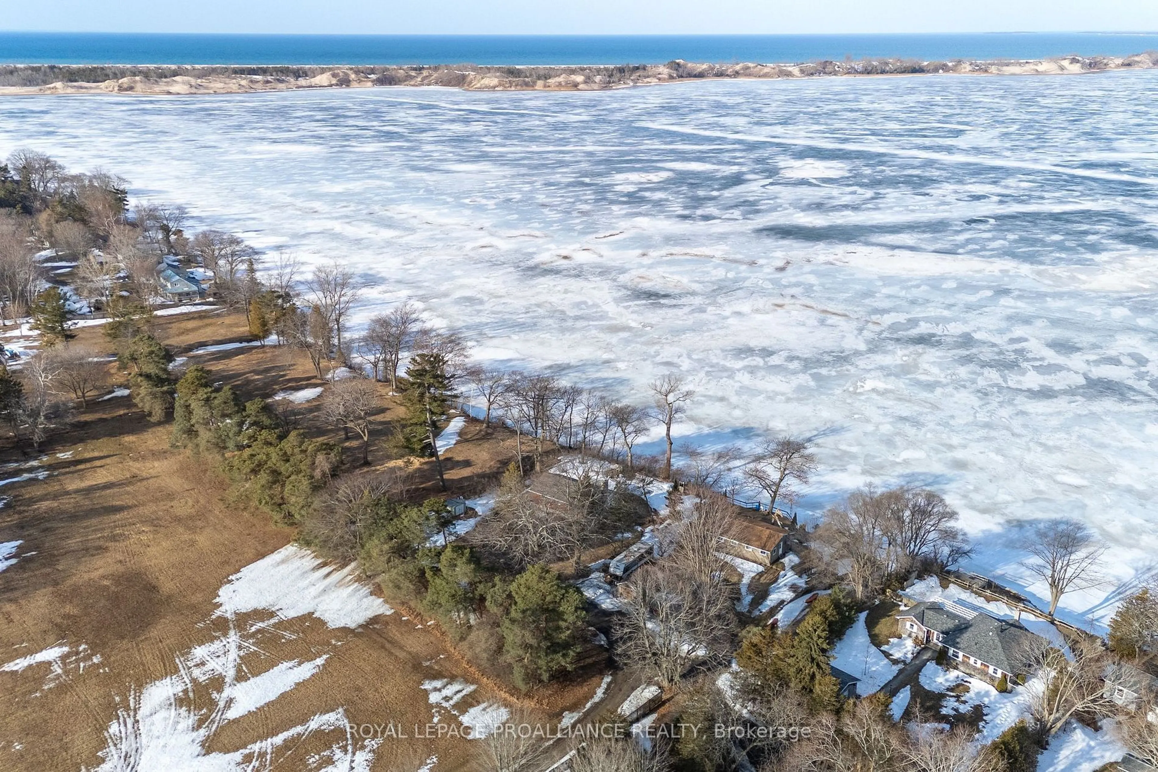 A pic from outside/outdoor area/front of a property/back of a property/a pic from drone, water/lake/river/ocean view for 40 Mayne Lane, Prince Edward County Ontario K0K 2T0