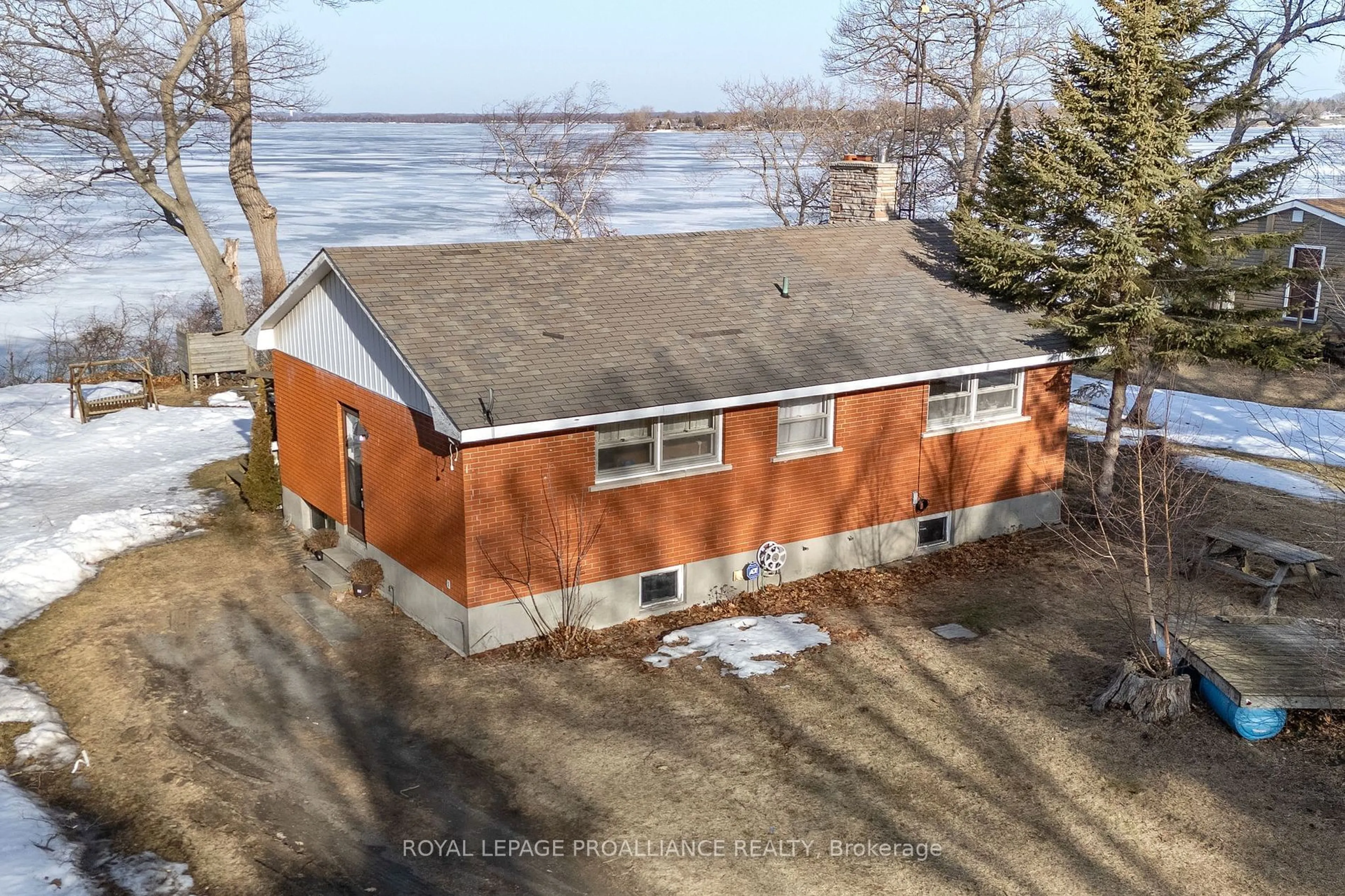 A pic from outside/outdoor area/front of a property/back of a property/a pic from drone, water/lake/river/ocean view for 40 Mayne Lane, Prince Edward County Ontario K0K 2T0