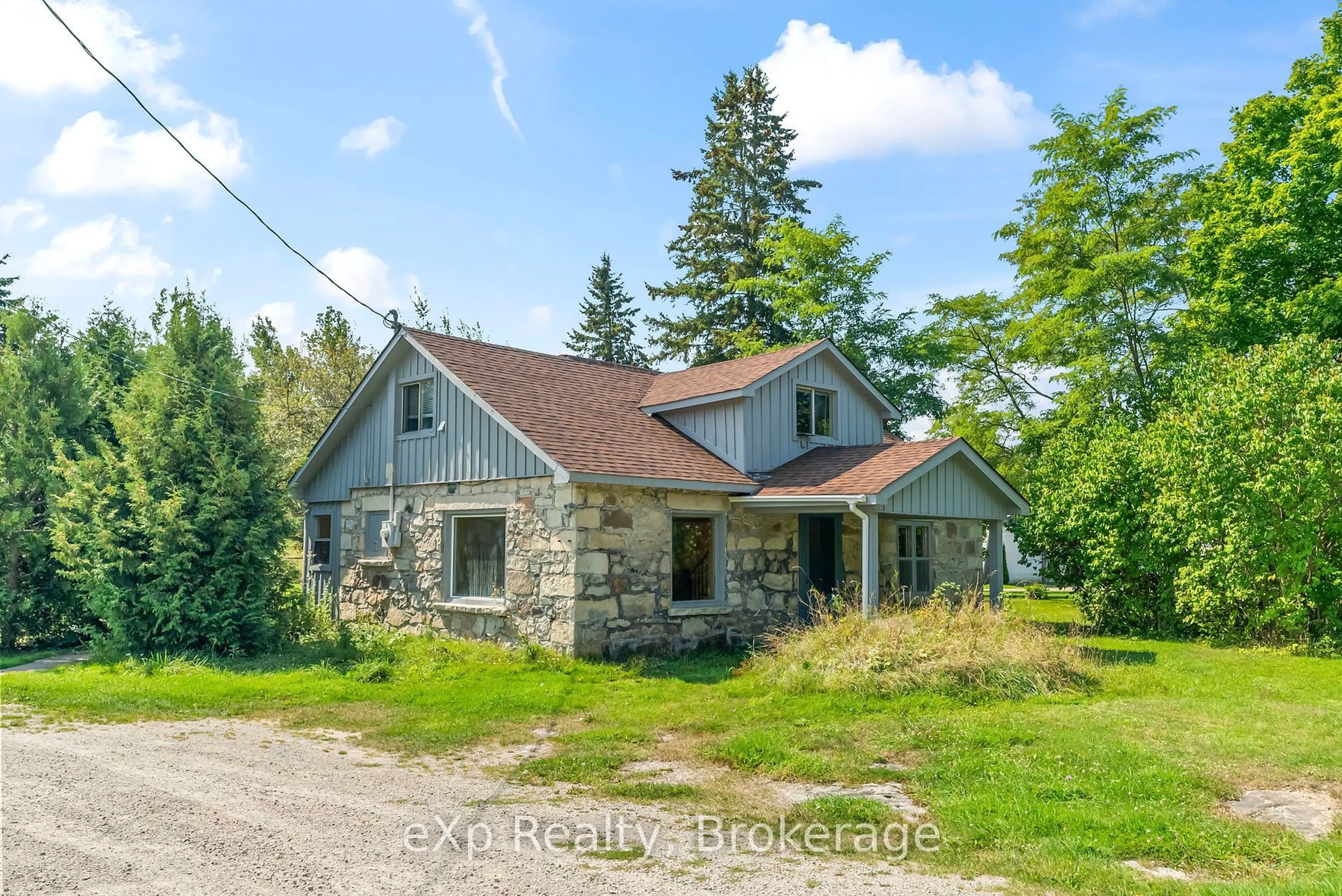 A pic from outside/outdoor area/front of a property/back of a property/a pic from drone, unknown for 217 HIGHWAY 6, South Bruce Peninsula Ontario N0H 2T0