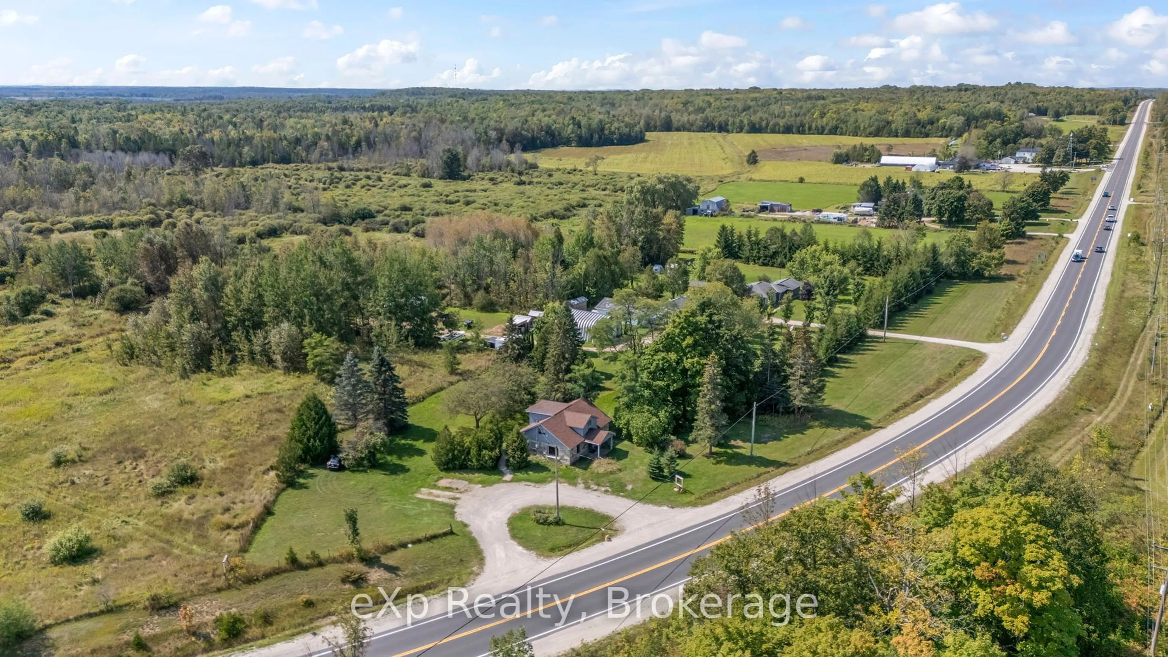 A pic from outside/outdoor area/front of a property/back of a property/a pic from drone, unknown for 217 HIGHWAY 6, South Bruce Peninsula Ontario N0H 2T0