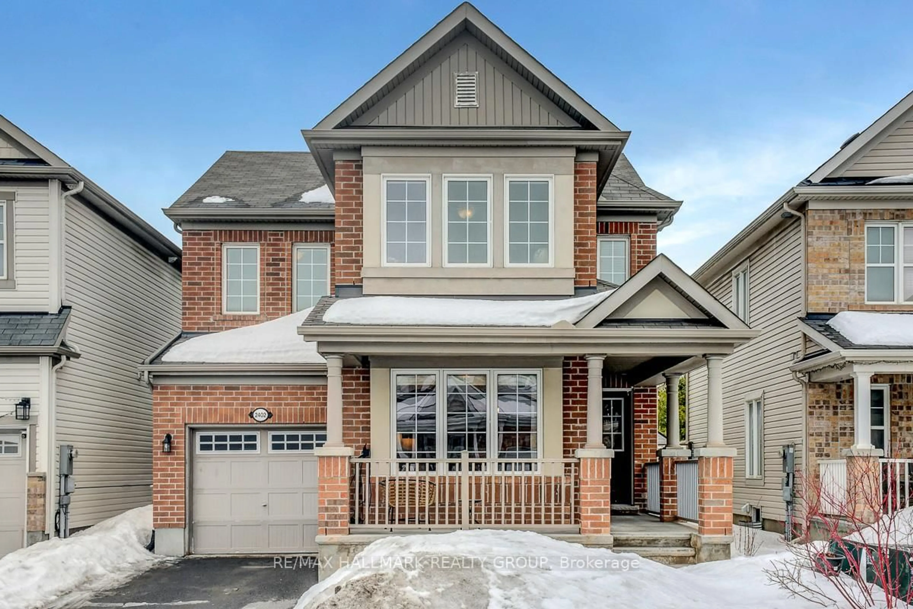 Home with brick exterior material, street for 2402 Regatta Ave, Barrhaven Ontario K2J 0T8