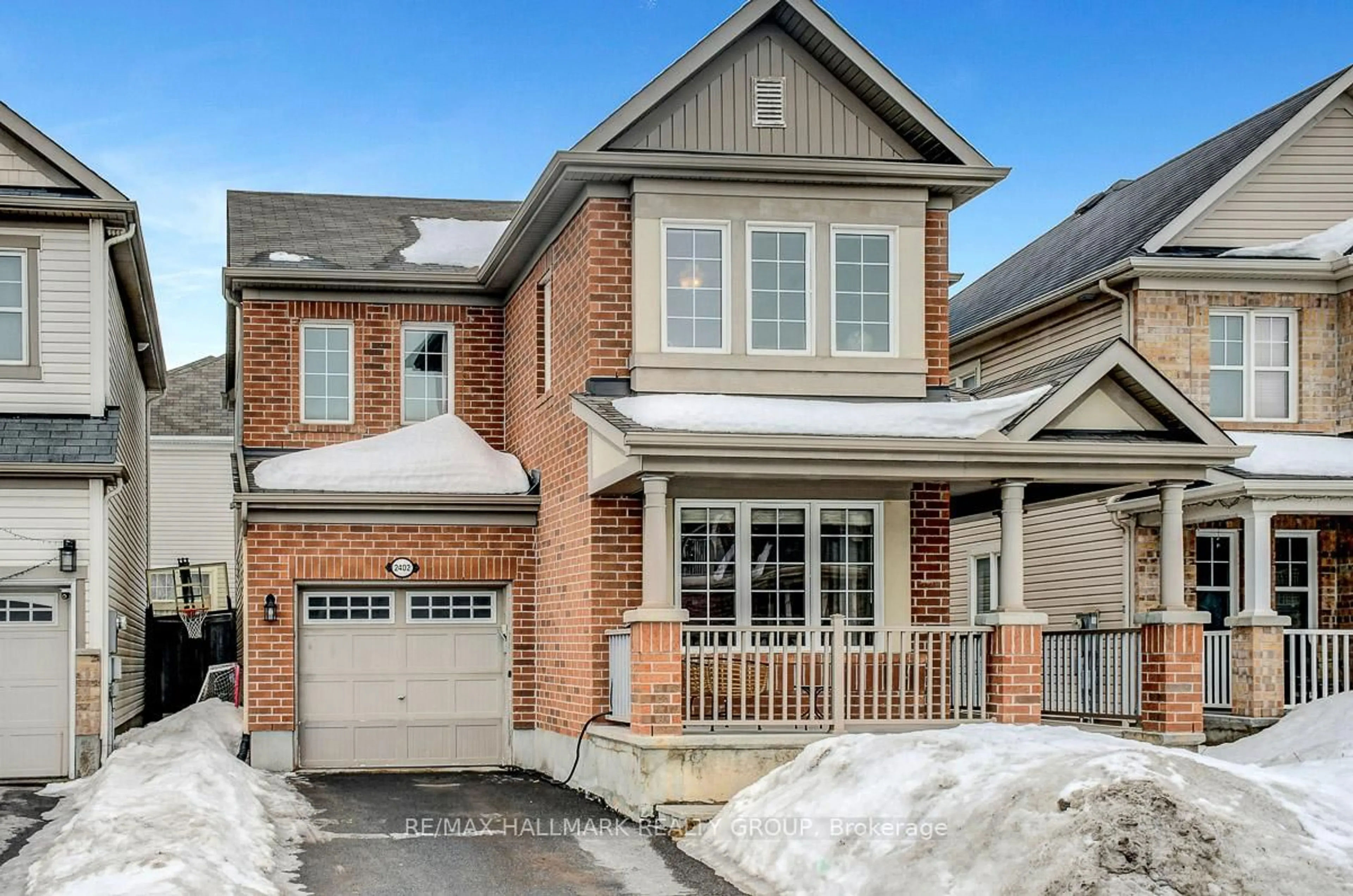 Home with brick exterior material, street for 2402 Regatta Ave, Barrhaven Ontario K2J 0T8