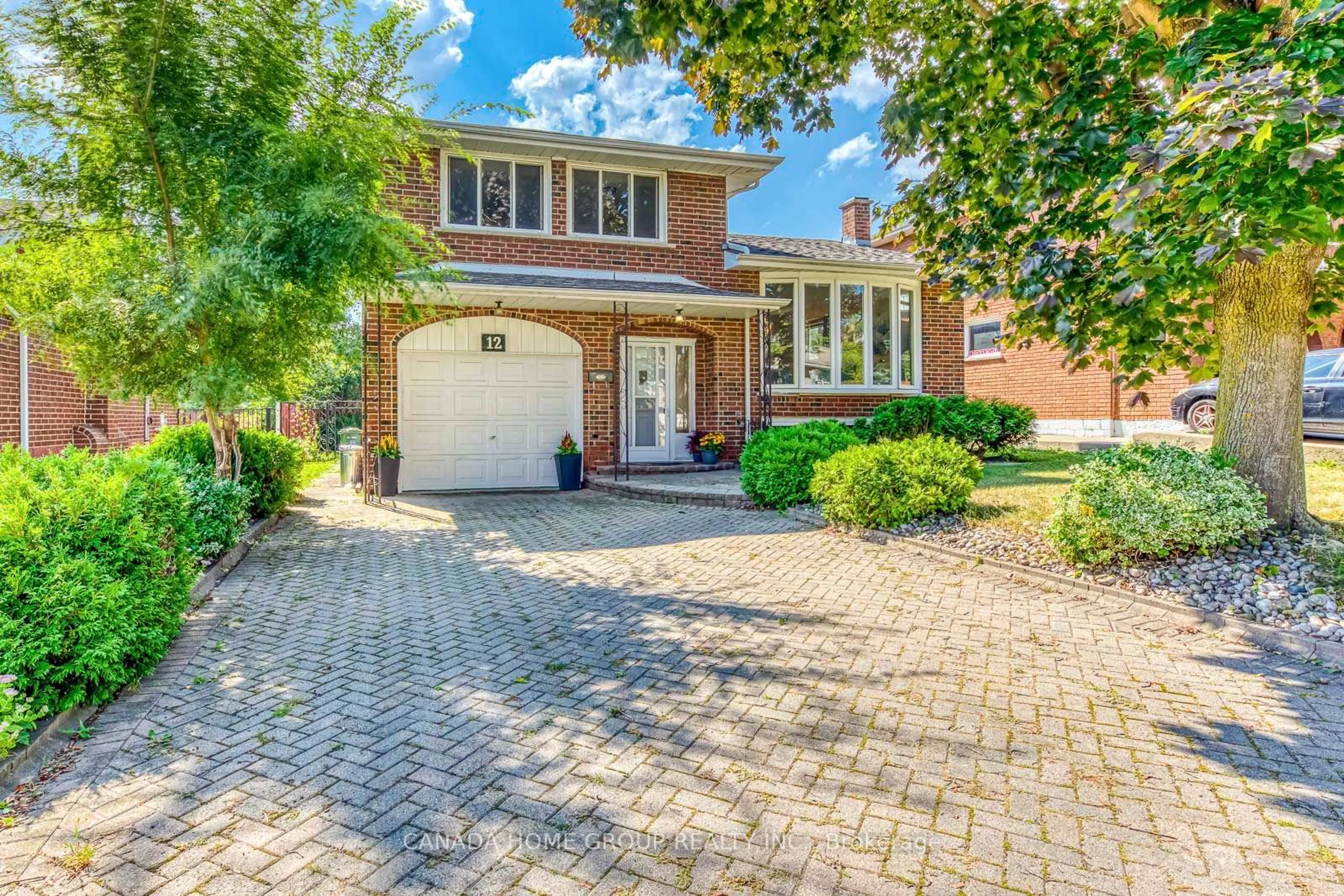 Home with brick exterior material, street for 12 Pinard St, Hamilton Ontario L8K 6G9