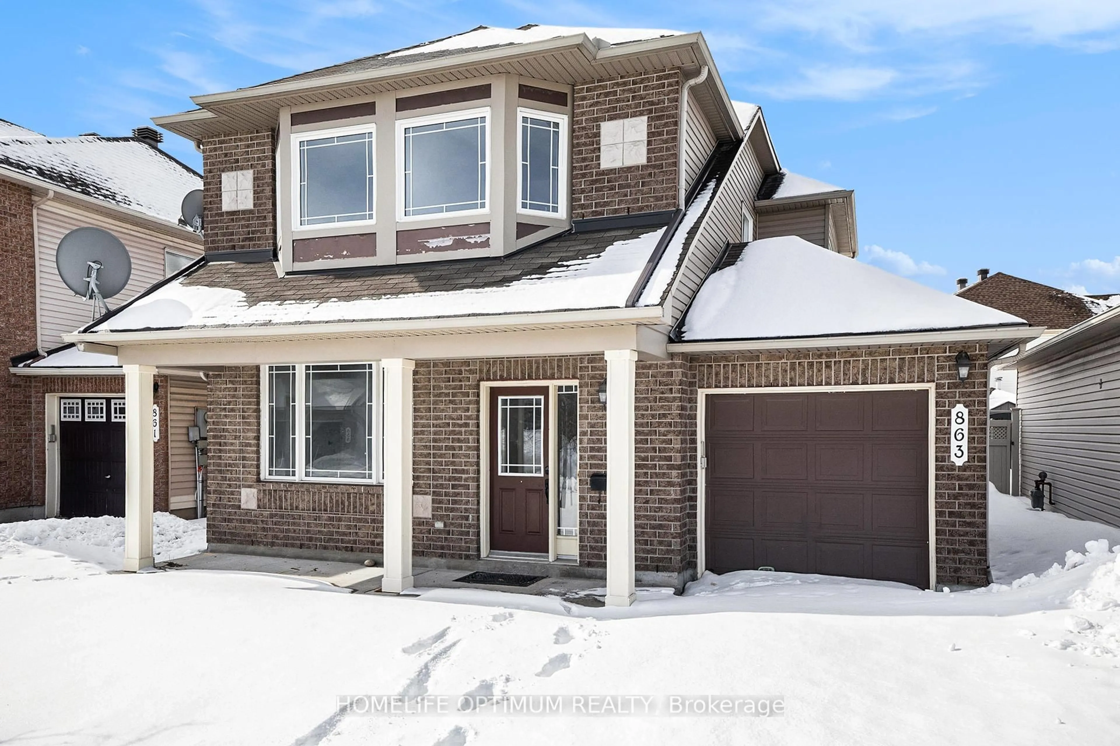 Home with brick exterior material, street for 863 Taradale Dr, Barrhaven Ontario K2J 5P3