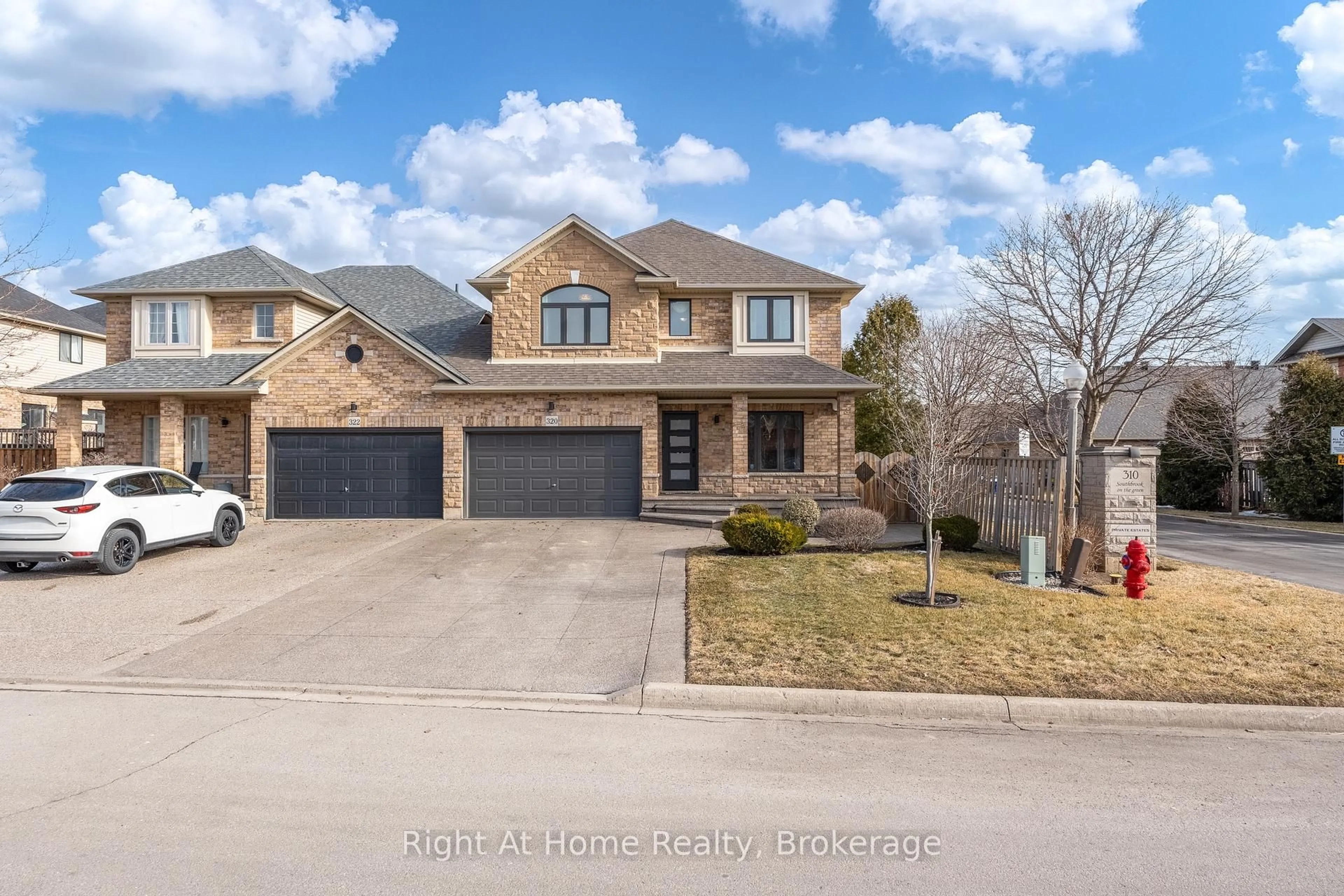 Home with brick exterior material, street for 320 Southbrook Dr, Hamilton Ontario L0R 1C0