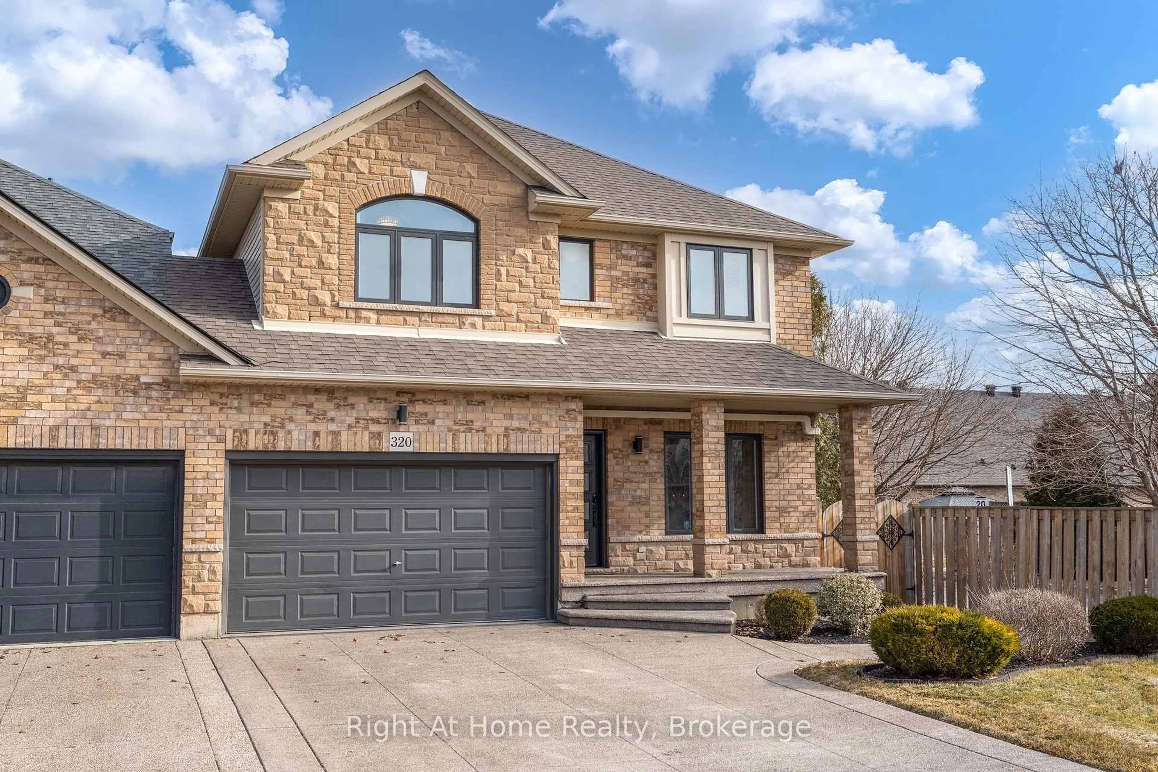 Home with brick exterior material, street for 320 Southbrook Dr, Hamilton Ontario L0R 1C0