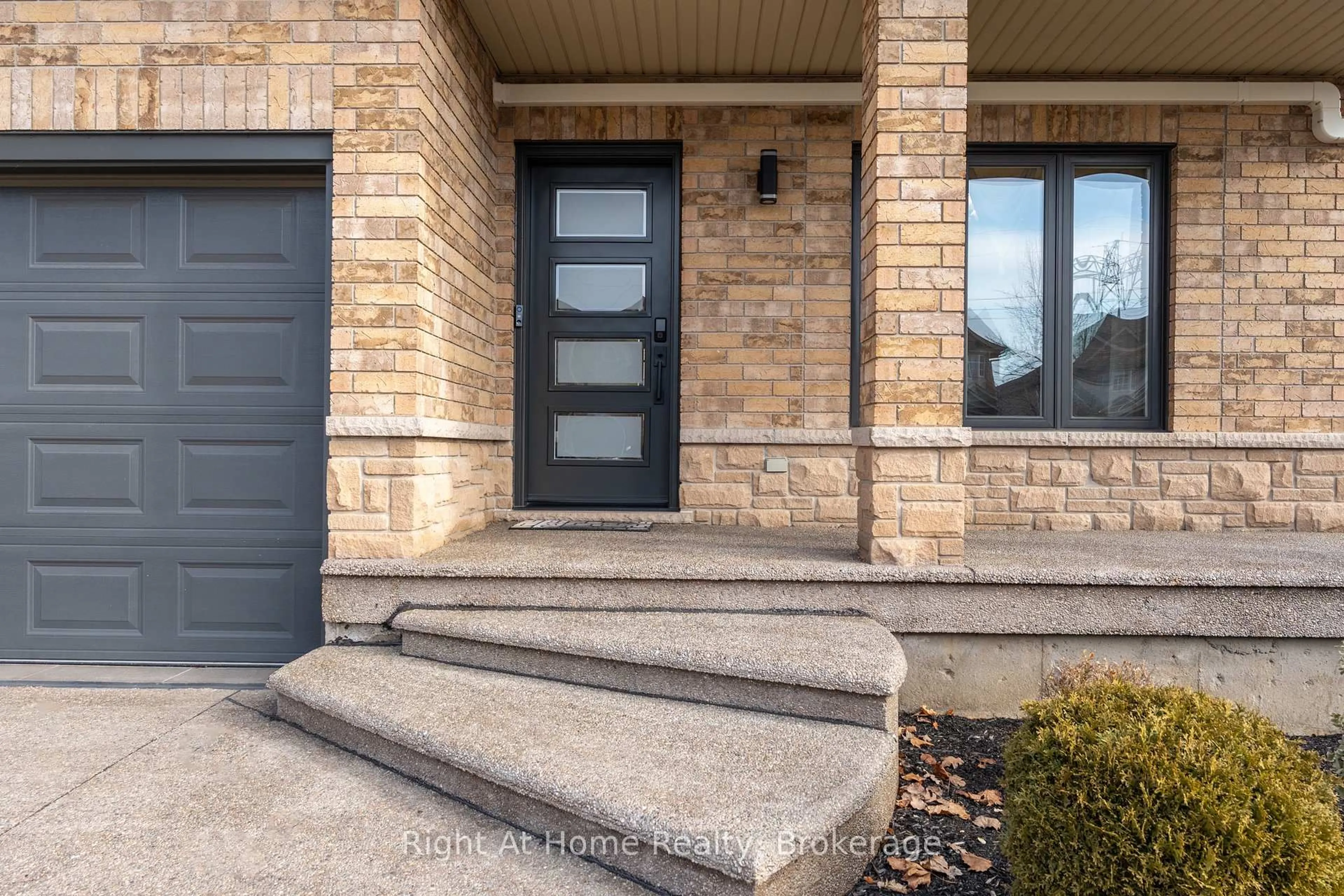 Home with brick exterior material, street for 320 Southbrook Dr, Hamilton Ontario L0R 1C0