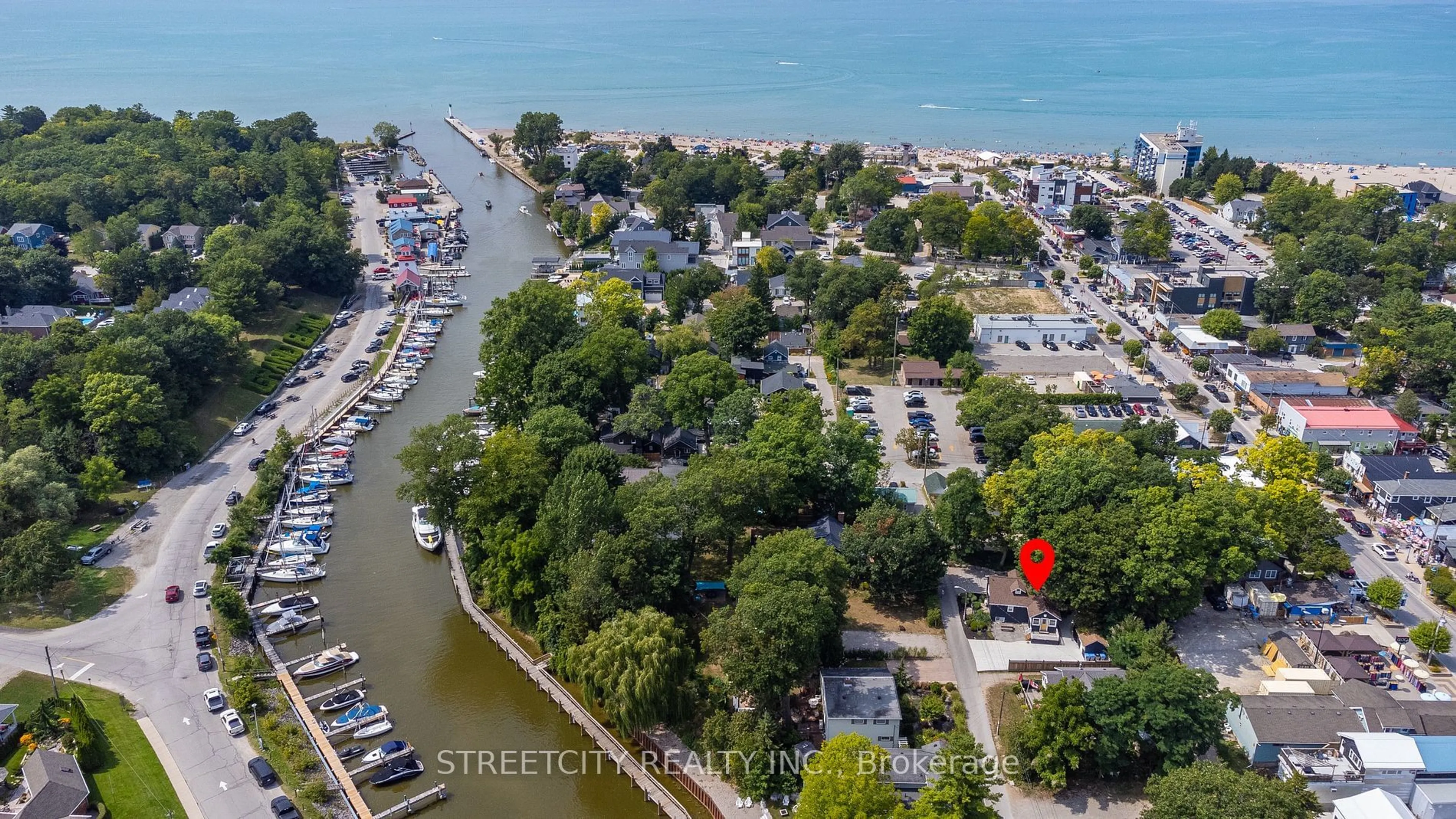 A pic from outside/outdoor area/front of a property/back of a property/a pic from drone, water/lake/river/ocean view for 35 Morenz Lane, Lambton Shores Ontario N0M 1T0