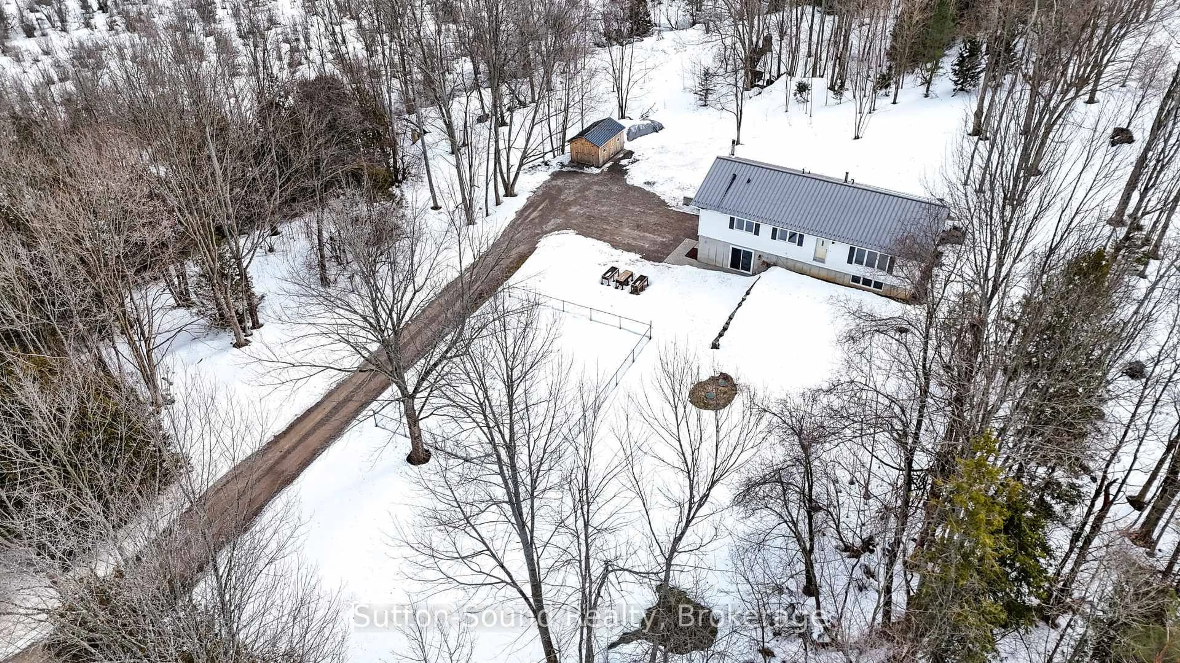 A pic from outside/outdoor area/front of a property/back of a property/a pic from drone, street for 387 Park Head Rd, South Bruce Peninsula Ontario N0H 1A0