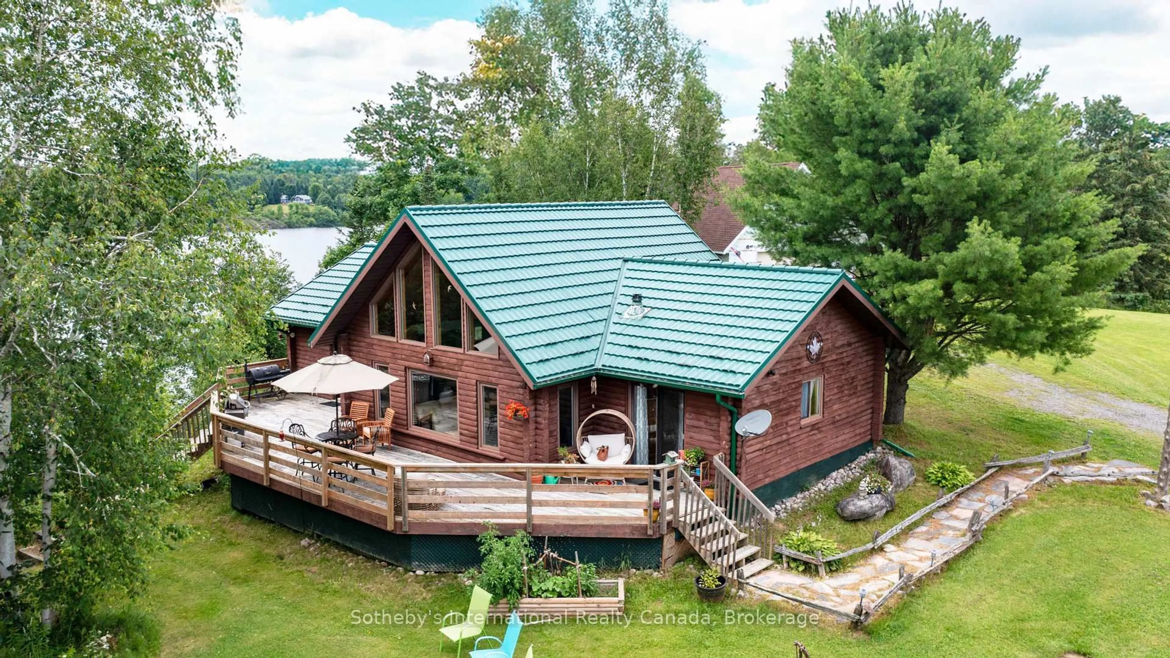 A pic from outside/outdoor area/front of a property/back of a property/a pic from drone, water/lake/river/ocean view for 20 Kodiak Rd, McKellar Ontario P0G 1G0