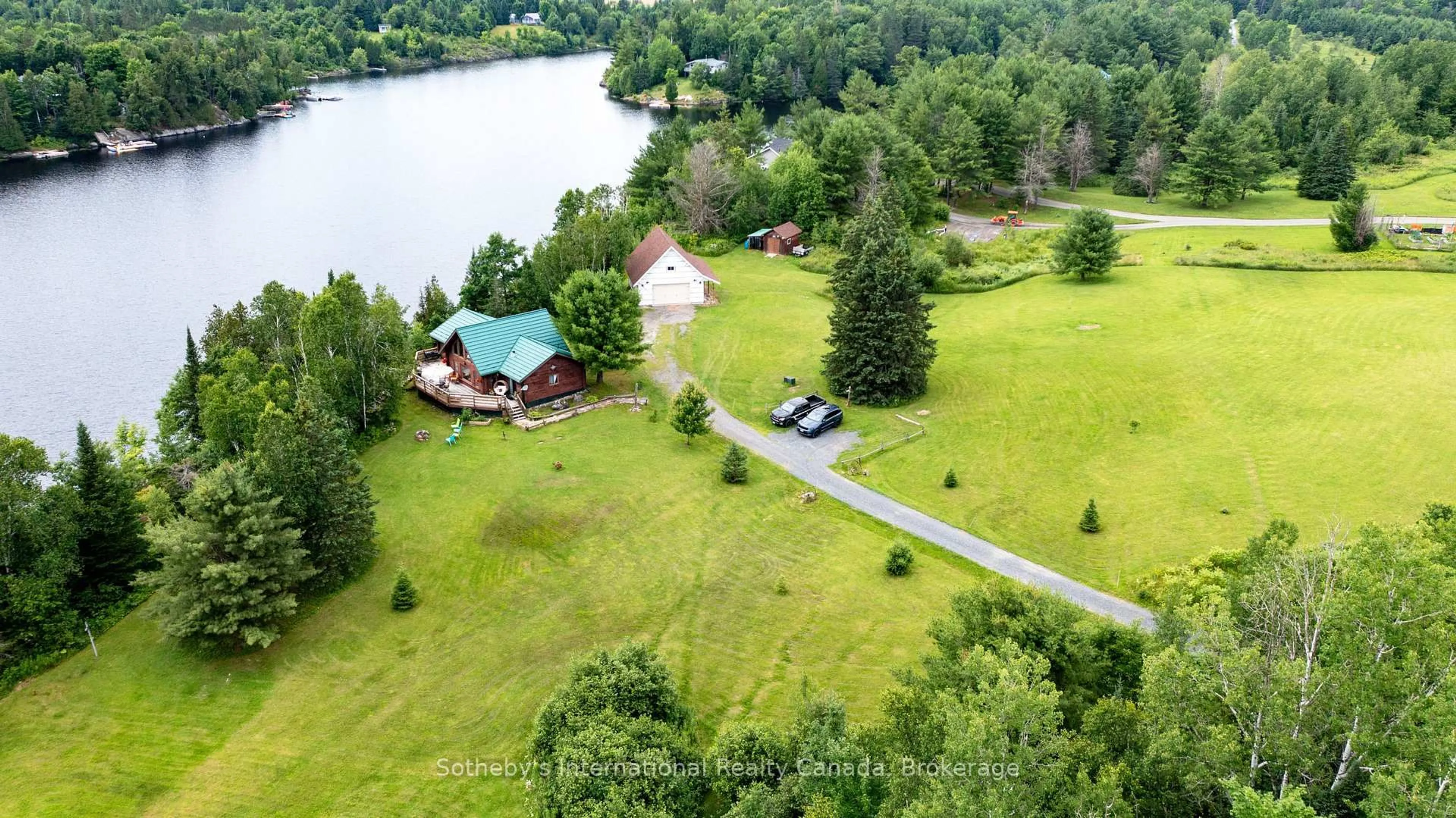 A pic from outside/outdoor area/front of a property/back of a property/a pic from drone, water/lake/river/ocean view for 20 Kodiak Rd, McKellar Ontario P0G 1G0