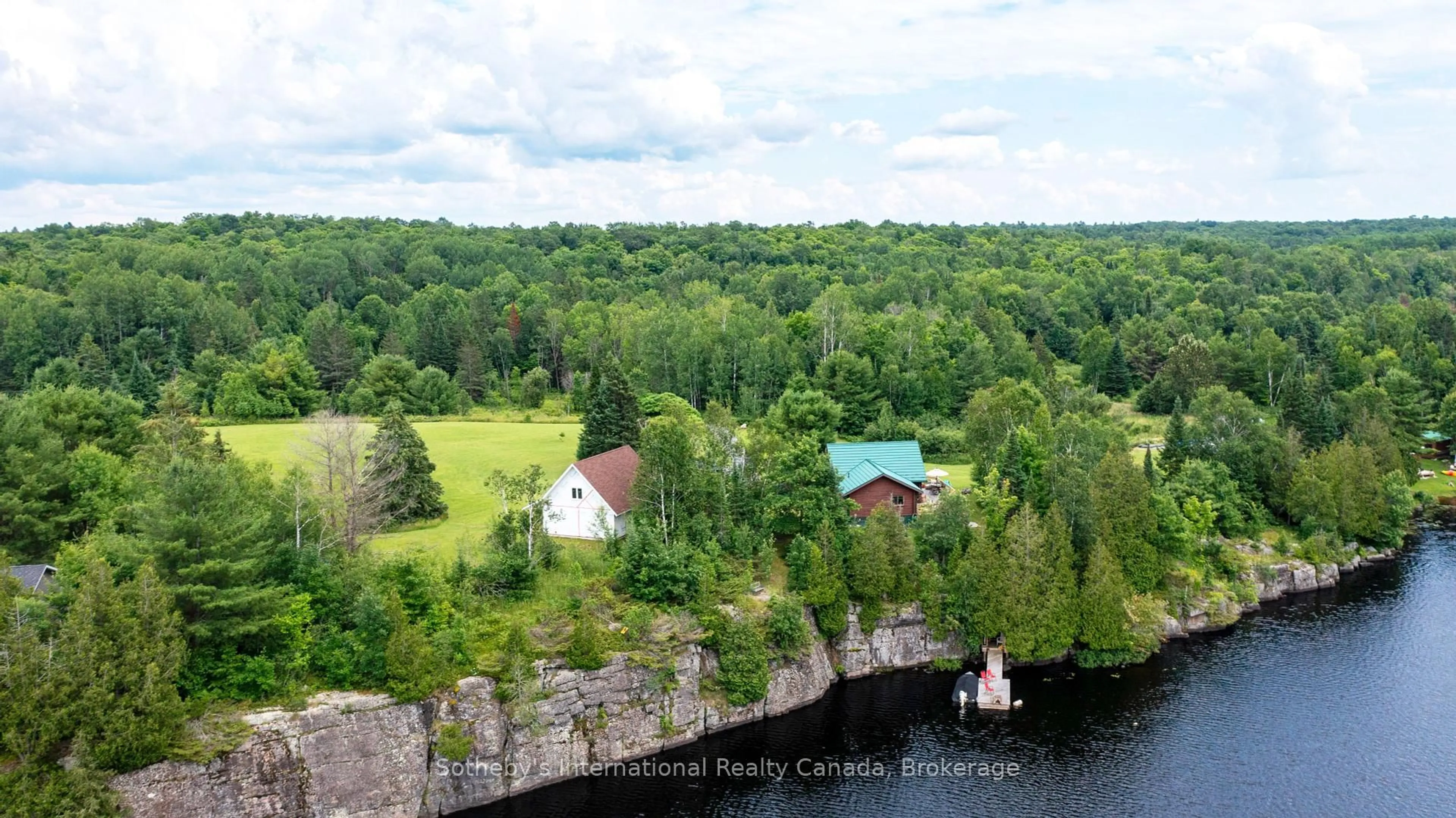 A pic from outside/outdoor area/front of a property/back of a property/a pic from drone, water/lake/river/ocean view for 20 Kodiak Rd, McKellar Ontario P0G 1G0