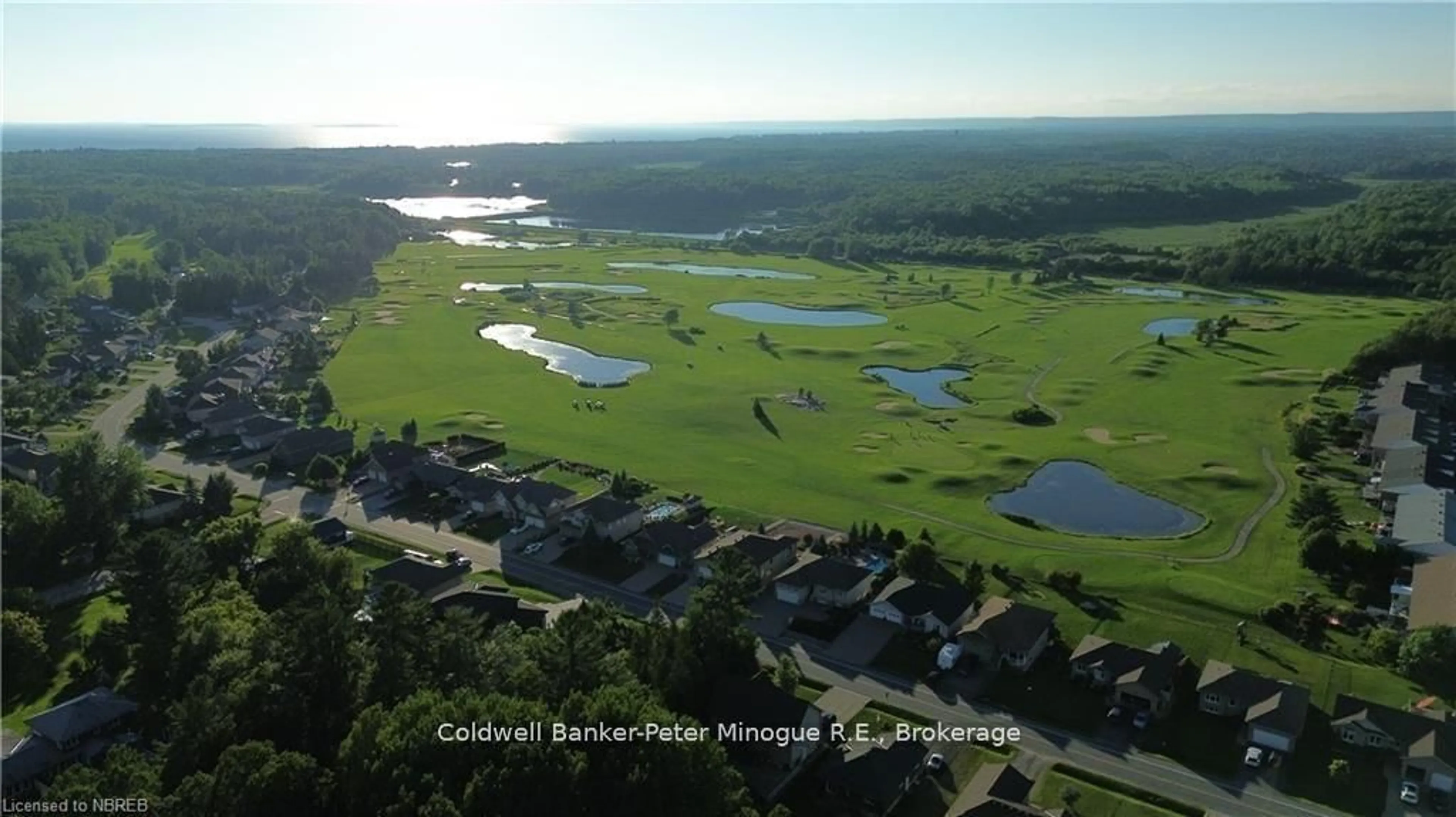 A pic from outside/outdoor area/front of a property/back of a property/a pic from drone, water/lake/river/ocean view for 26 Masson Lane, North Bay Ontario P0H 1H0