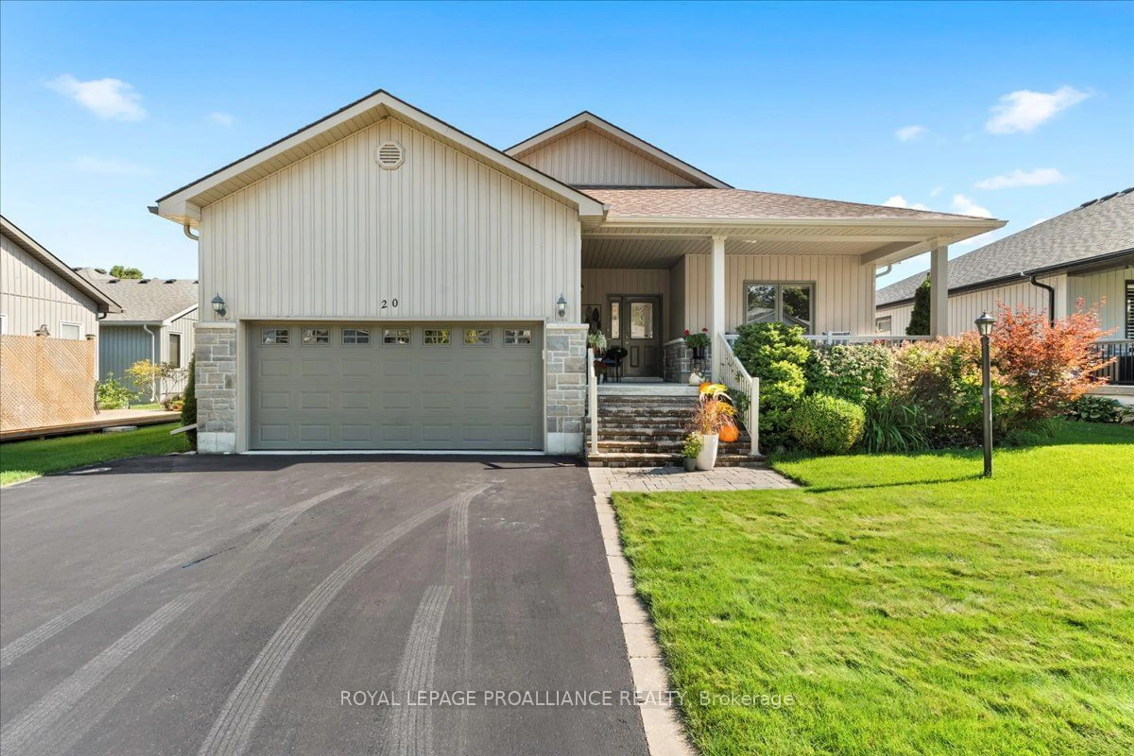 Home with vinyl exterior material, street for 20 Conger Dr, Prince Edward County Ontario K0K 3L0