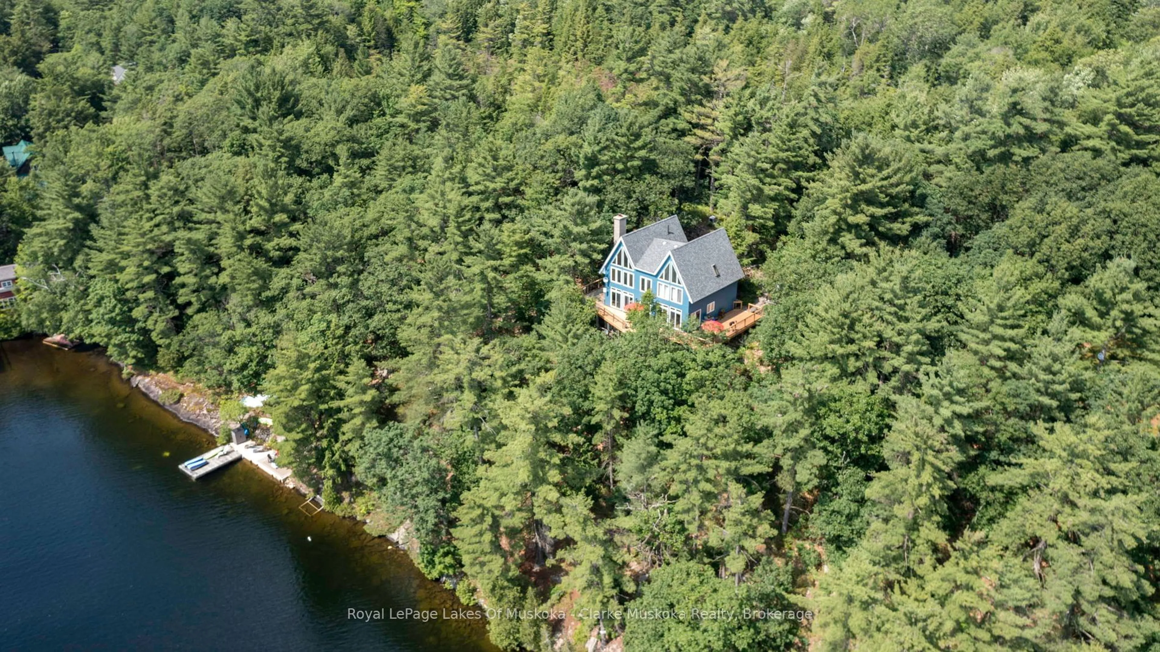 A pic from outside/outdoor area/front of a property/back of a property/a pic from drone, water/lake/river/ocean view for 12 Osprey Rd, Seguin Ontario P0C 1H0