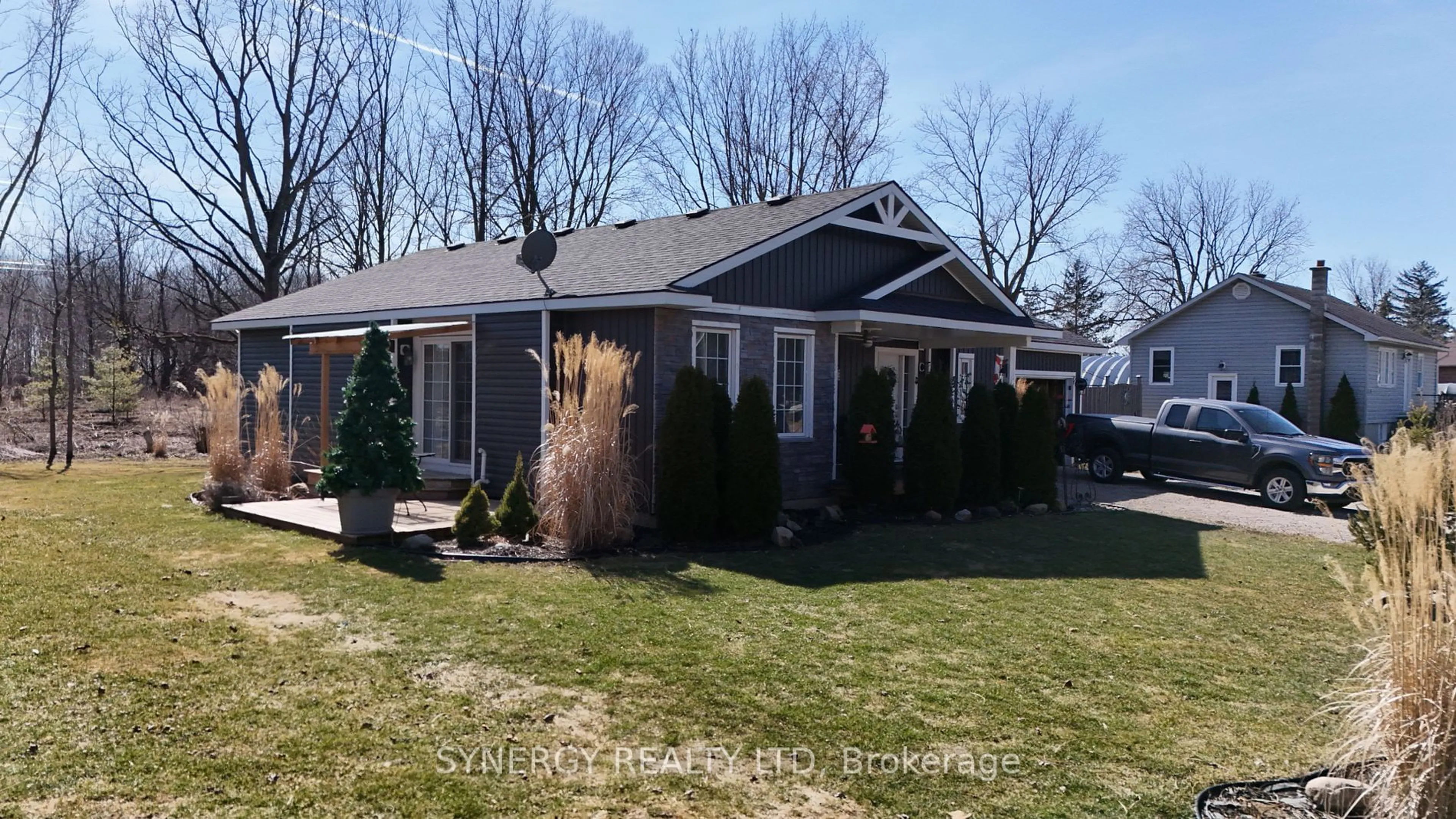 Home with vinyl exterior material, street for 7953 Railroad Line, Brooke-Alvinston Ontario N0M 2S0