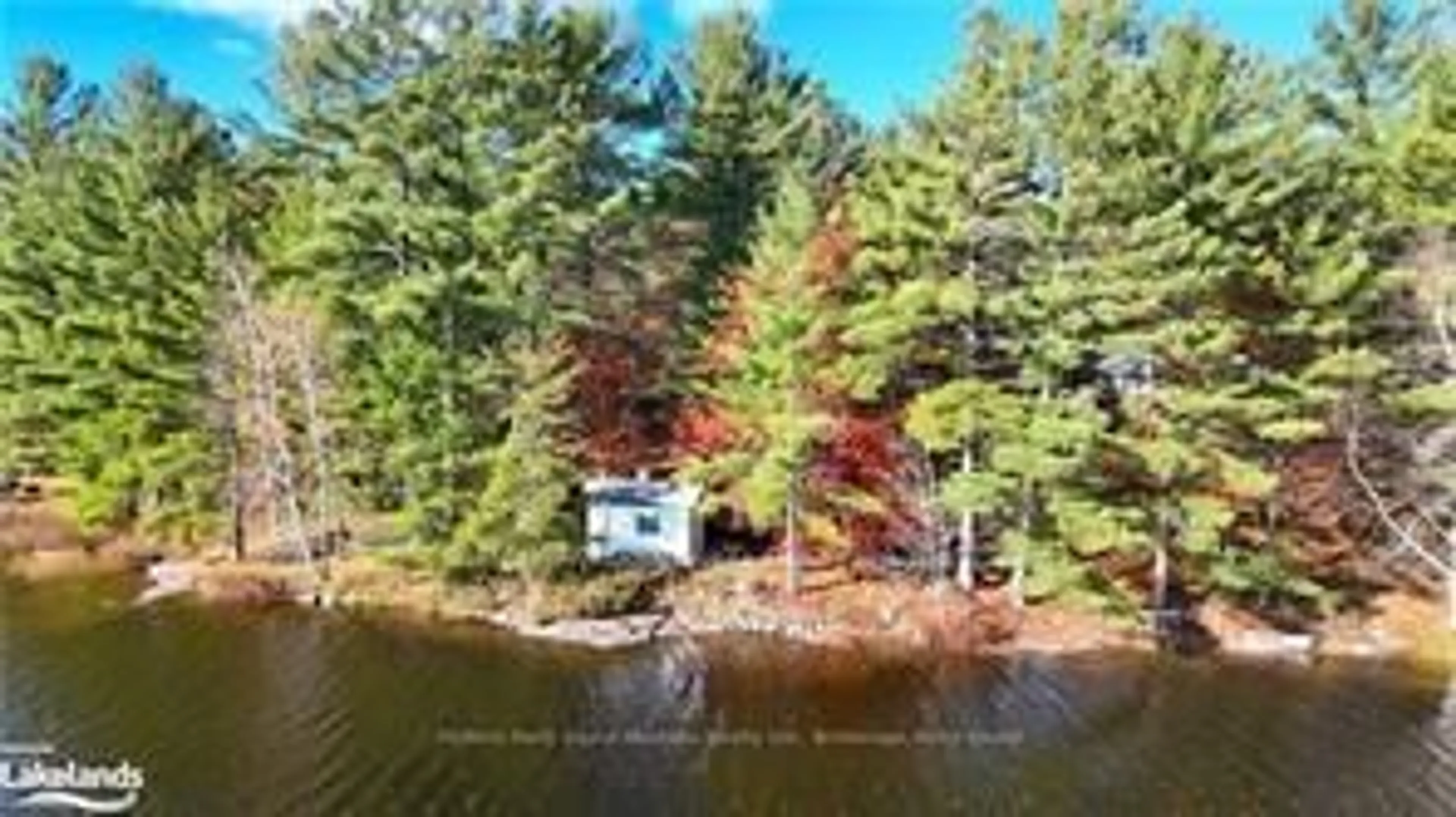 A pic from outside/outdoor area/front of a property/back of a property/a pic from drone, water/lake/river/ocean view for 27 STORM LAKE Rd, Seguin Ontario P2A 0B6